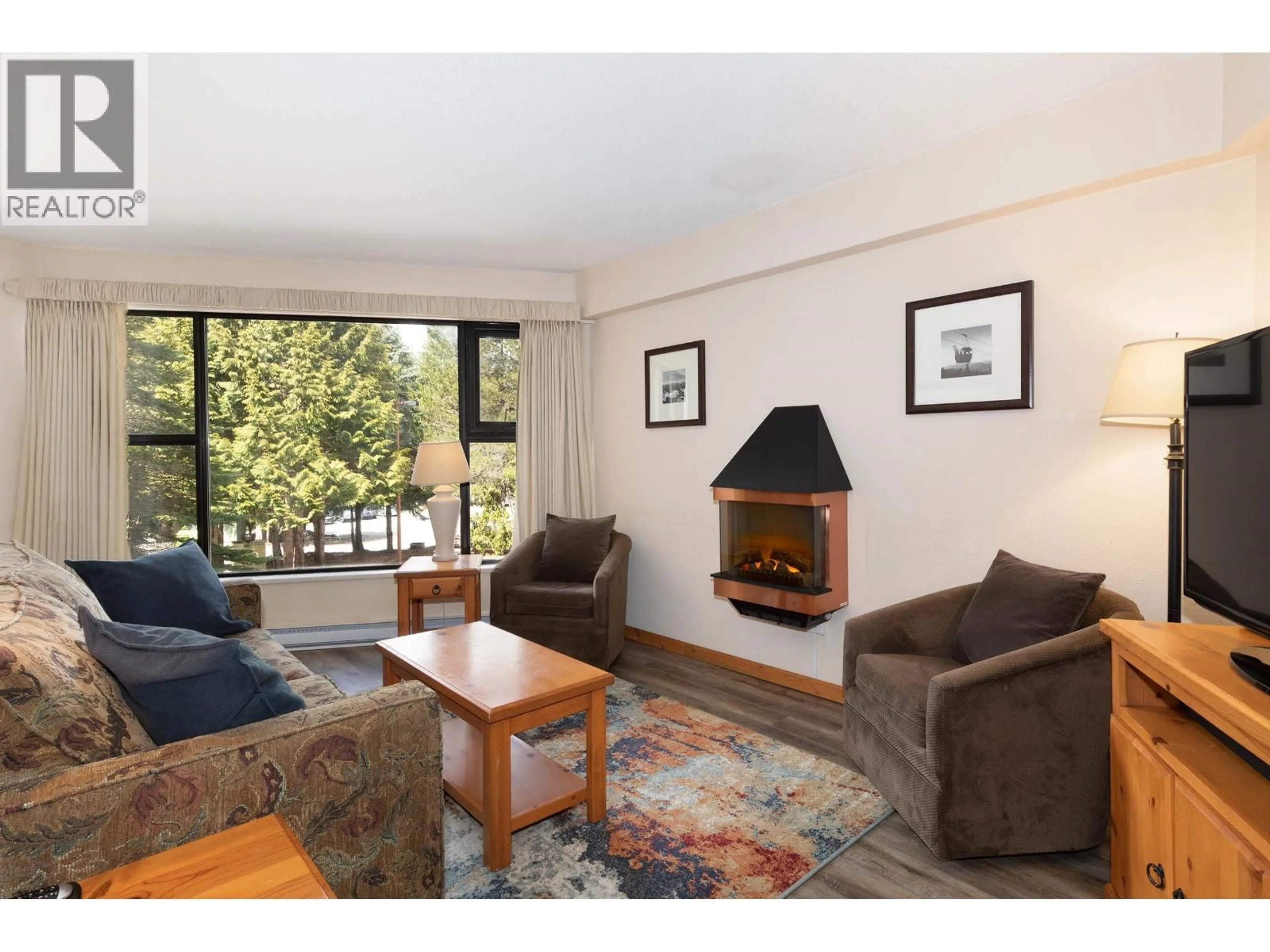 Living room with furniture, unknown for 6A - 2561 TRICOUNI PLACE, Whistler British Columbia V8E0A8
