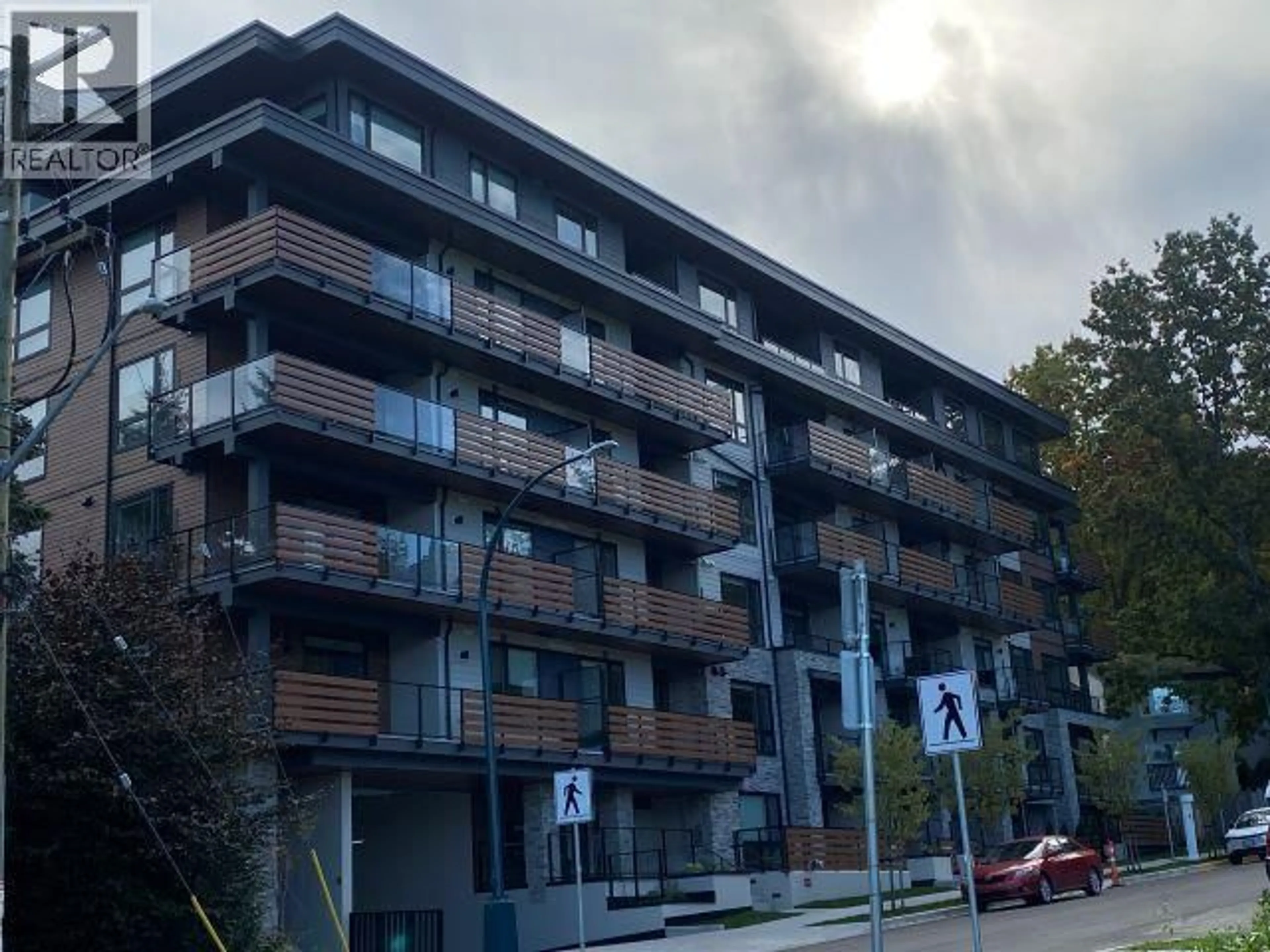 A pic from outside/outdoor area/front of a property/back of a property/a pic from drone, building for 405 - 150 JAMES ROAD, Port Moody British Columbia V3H0N7