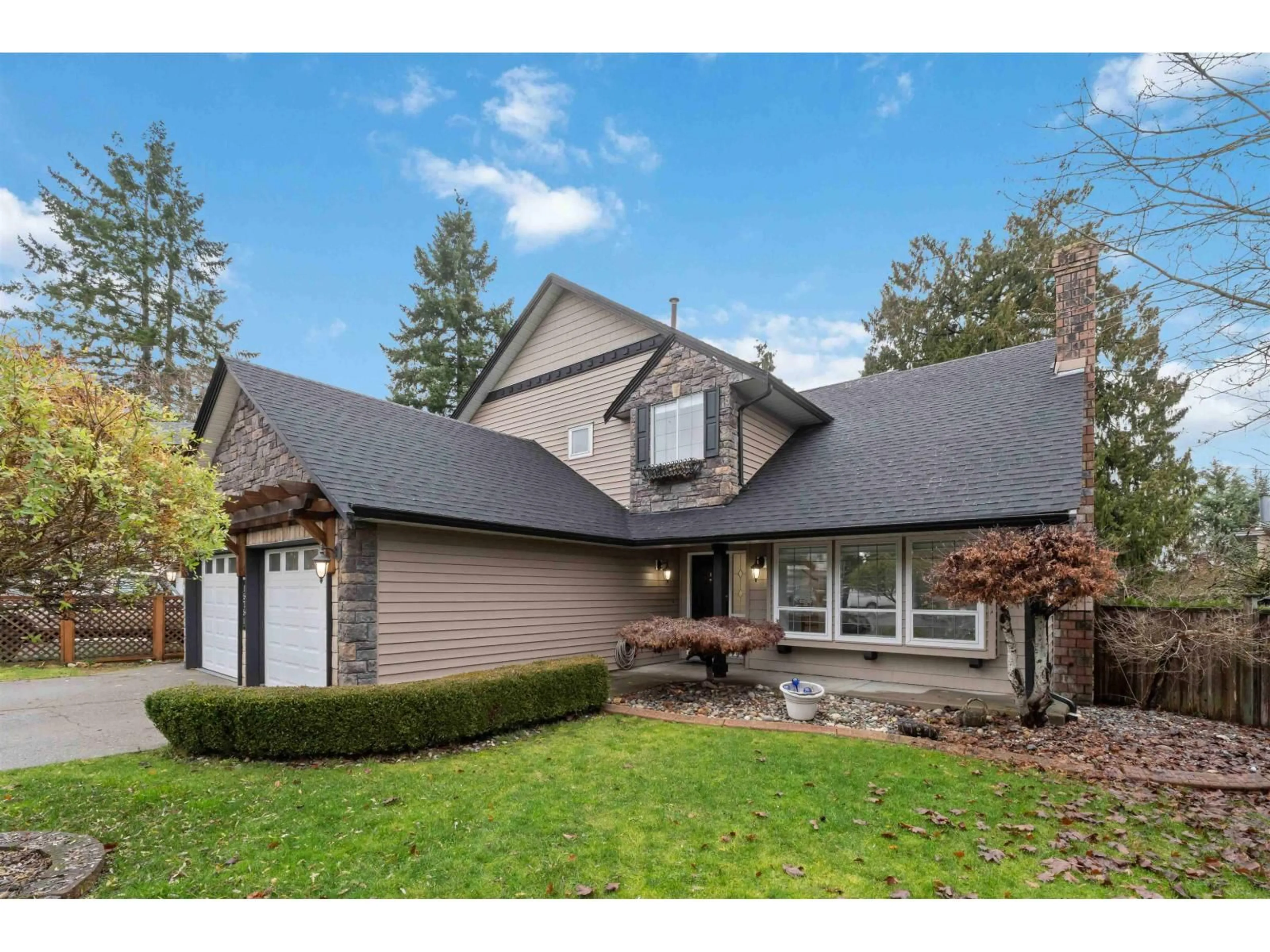 Home with vinyl exterior material, street for 15751 98A AVENUE, Surrey British Columbia V4N2V7