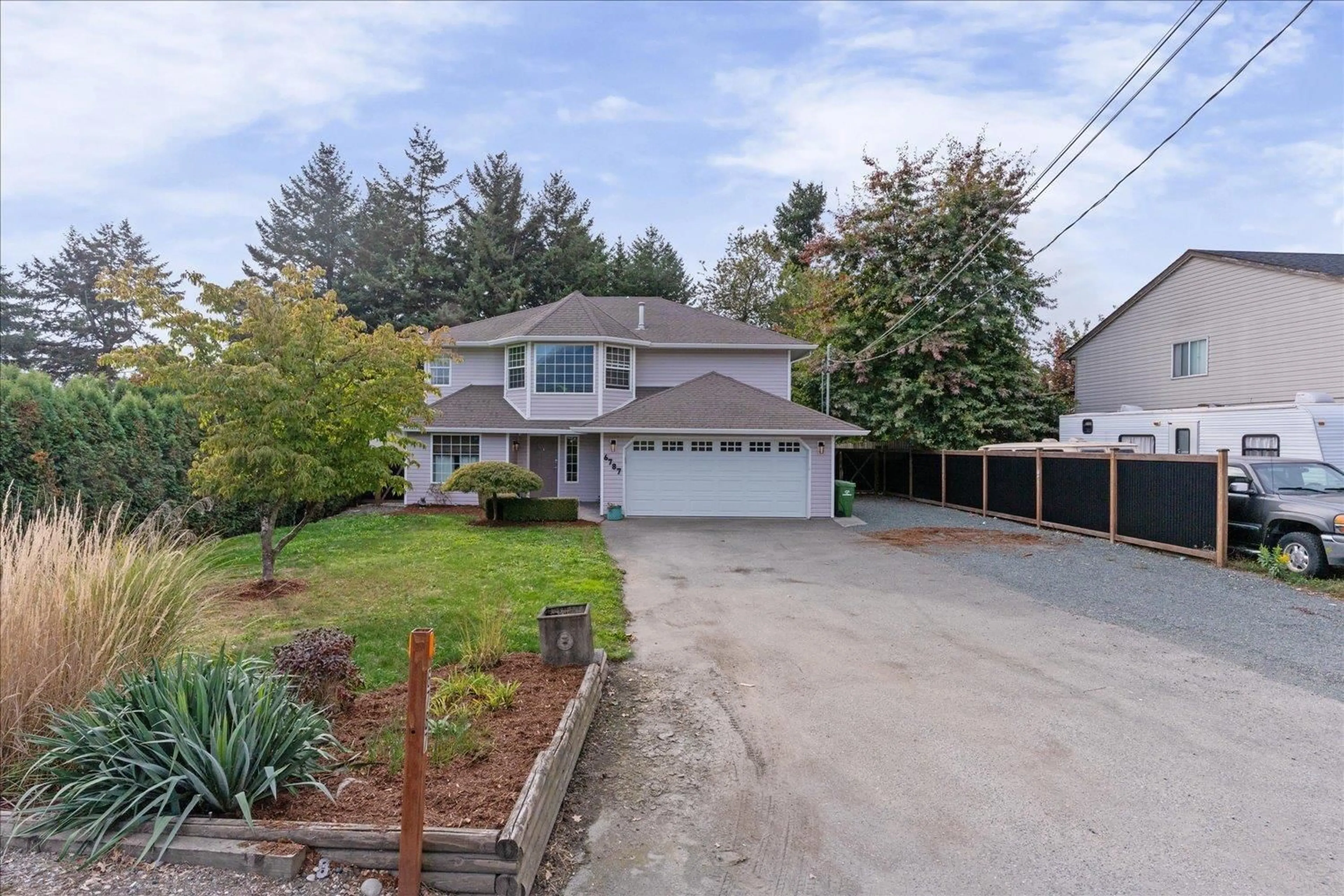A pic from outside/outdoor area/front of a property/back of a property/a pic from drone, street for 6787 CHILLIWACK RIVER ROAD, Chilliwack British Columbia V2R4M2