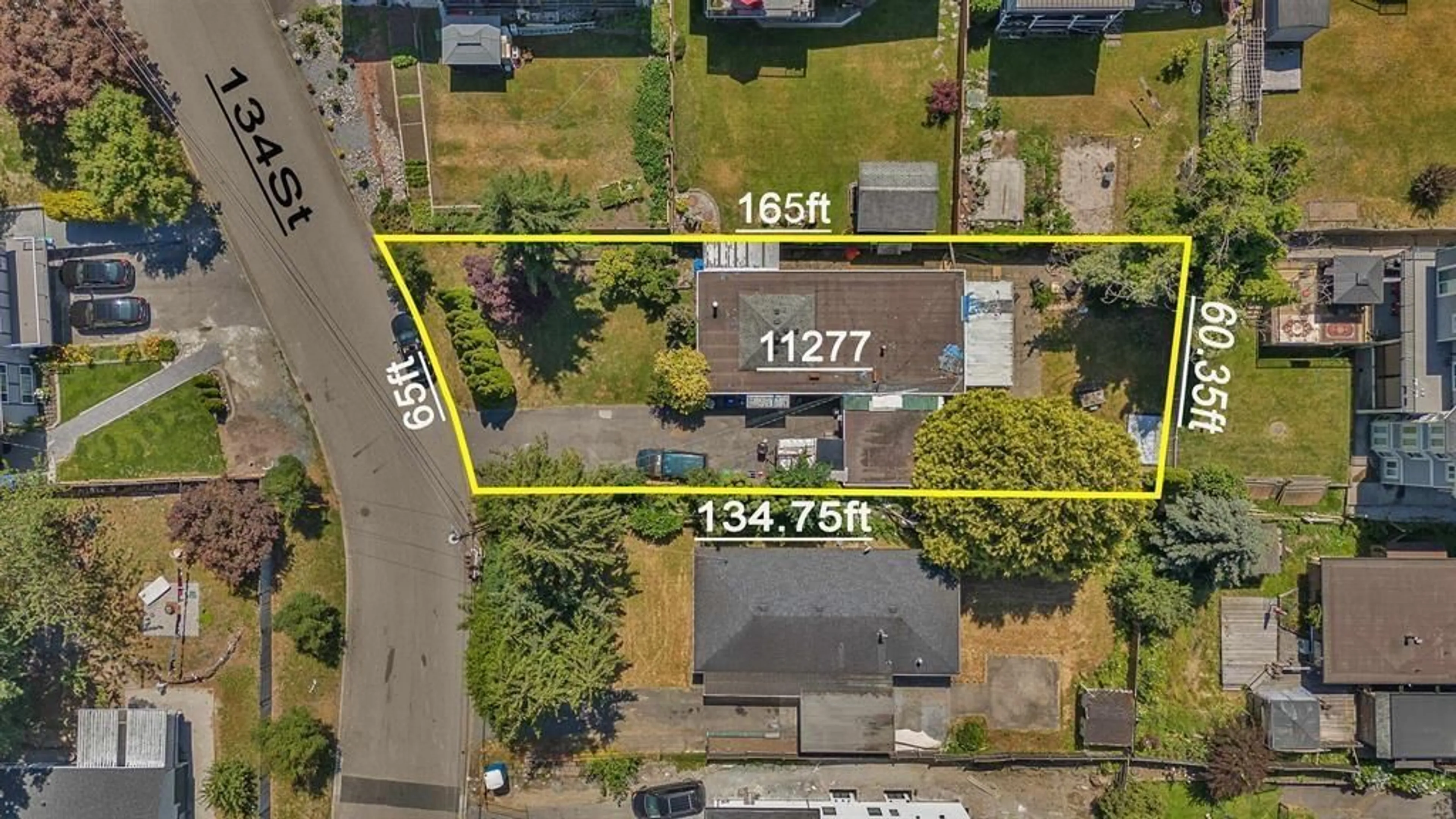 A pic from outside/outdoor area/front of a property/back of a property/a pic from drone, street for 11277 134 ST STREET, Surrey British Columbia V3R2Z2