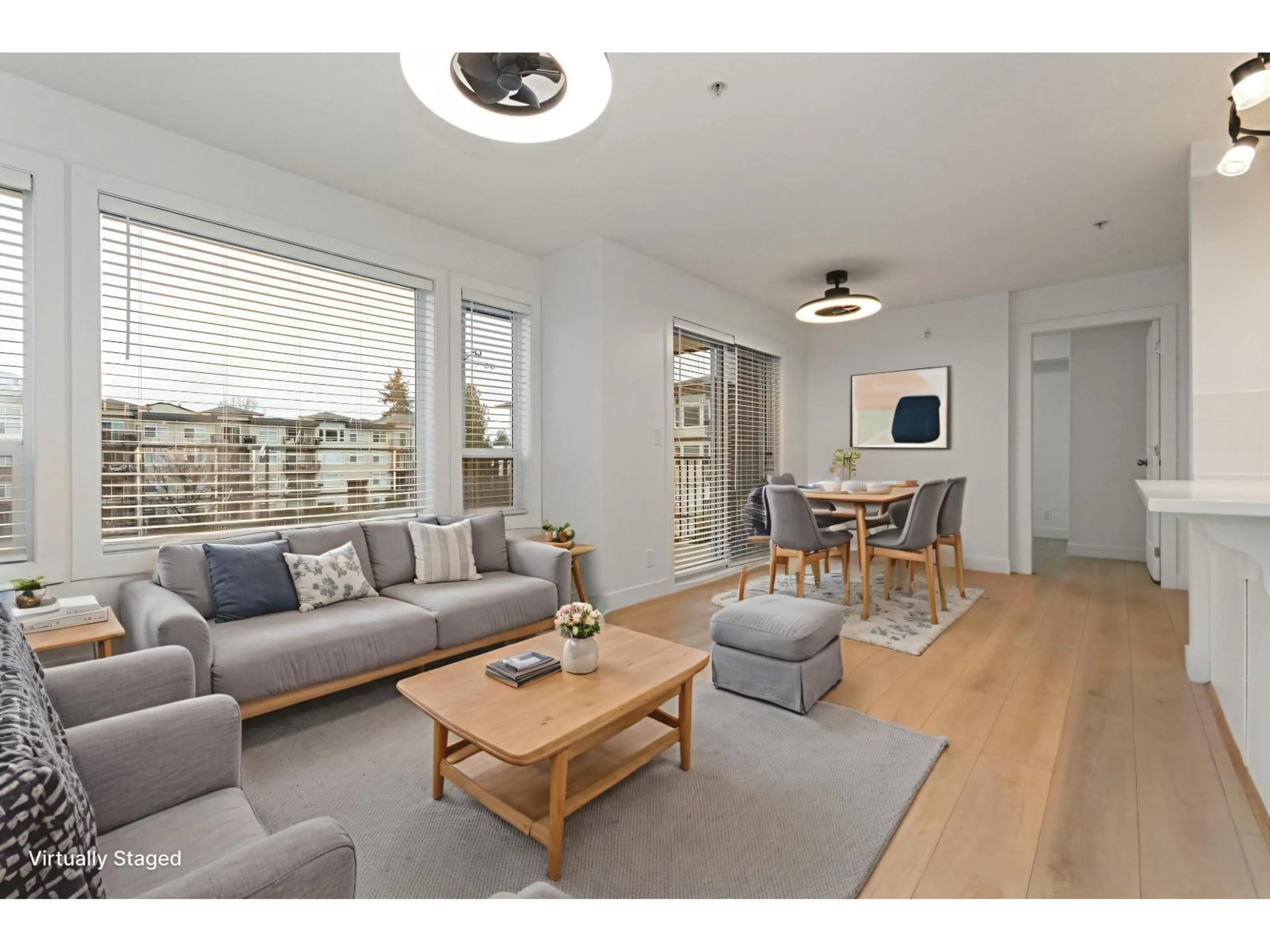 Living room with furniture, wood/laminate floor for 319 - 46289 YALE ROAD, Chilliwack British Columbia V2P0B9