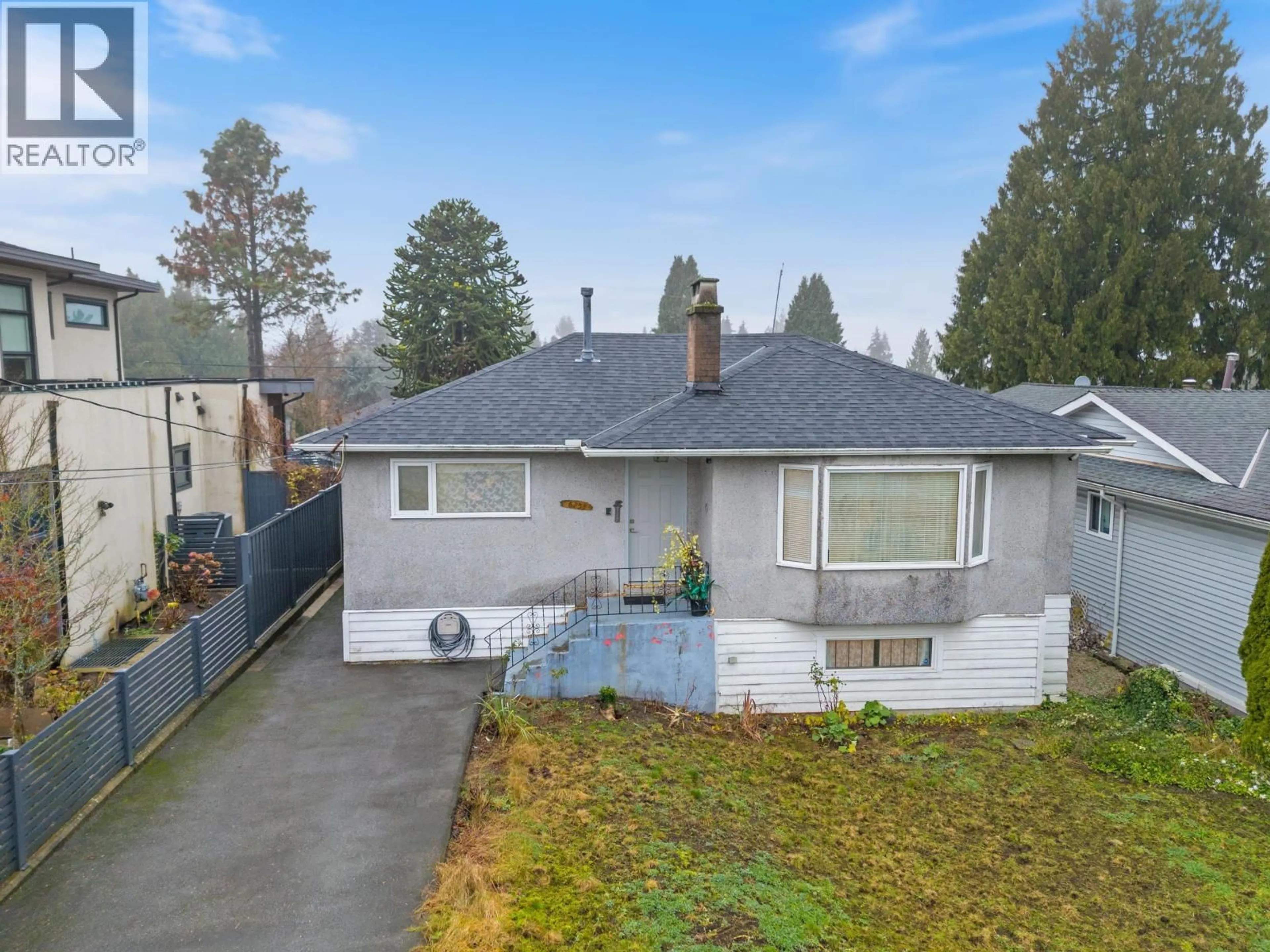 A pic from outside/outdoor area/front of a property/back of a property/a pic from drone, street for 8255 18TH AVENUE, Burnaby British Columbia V3N1K4