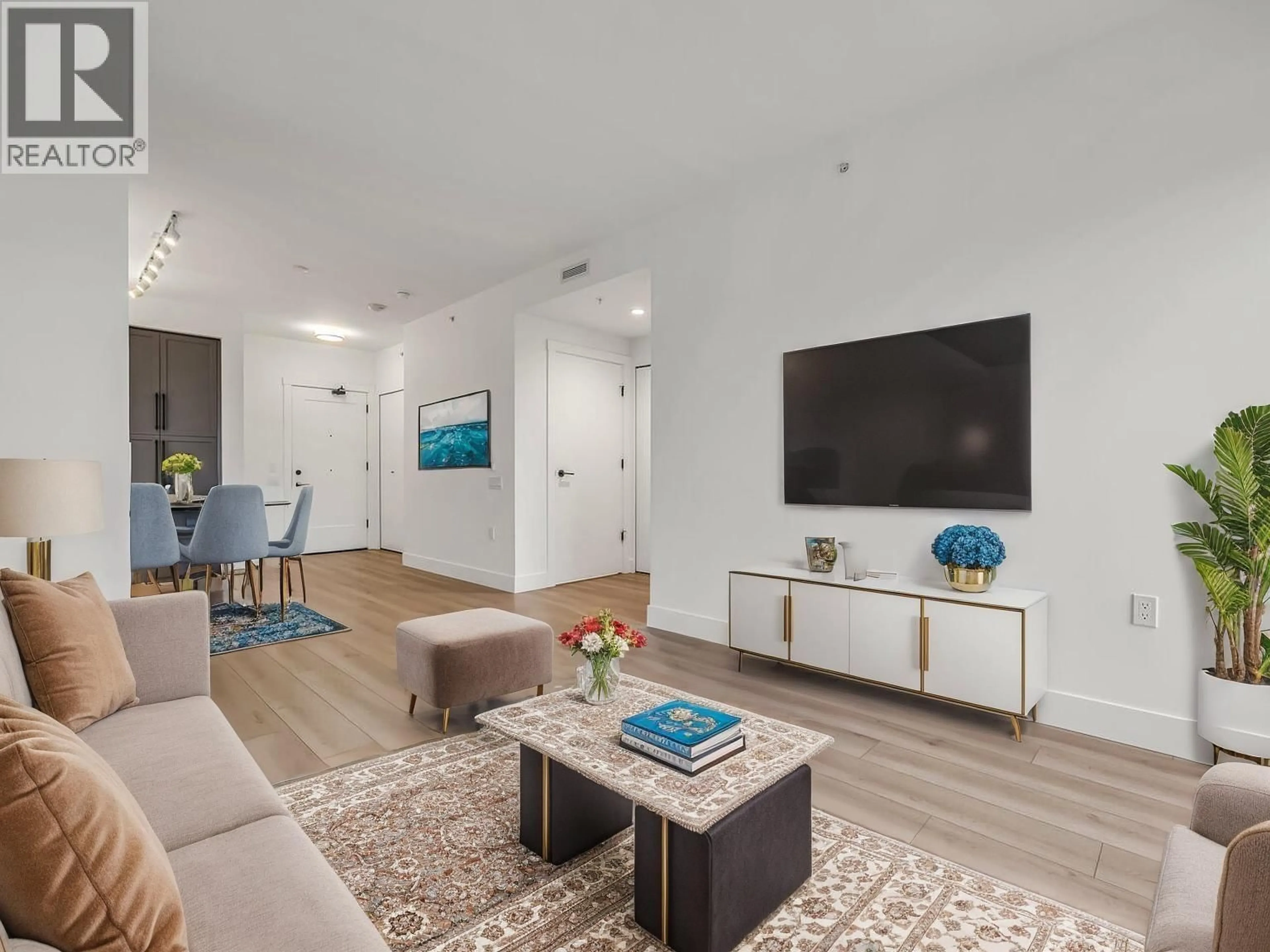 Living room with furniture, unknown for 803 - 8750 UNIVERSITY CRESCENT, Burnaby British Columbia V5A0G9