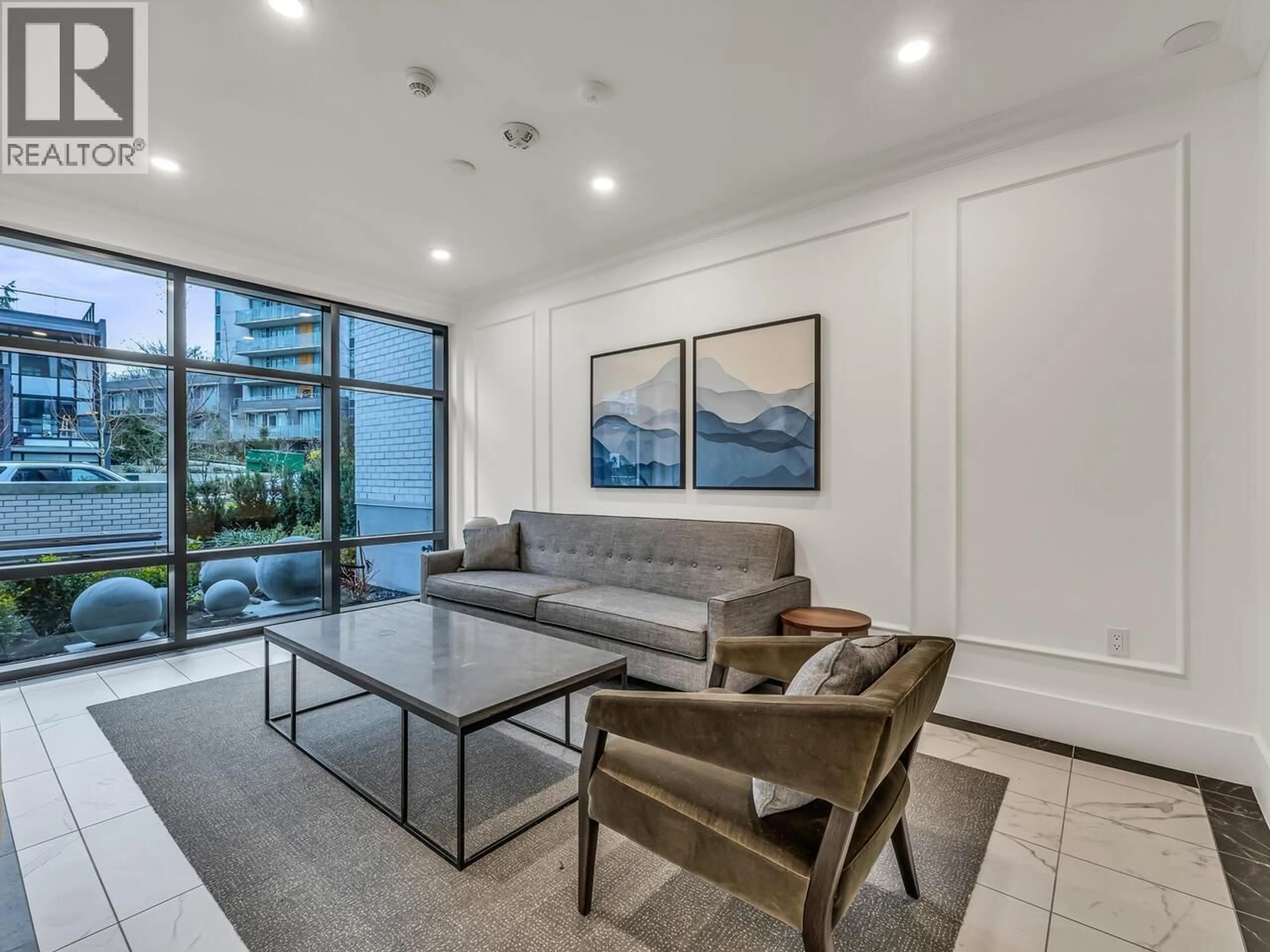 Living room with furniture, unknown for 803 - 8750 UNIVERSITY CRESCENT, Burnaby British Columbia V5A0G9