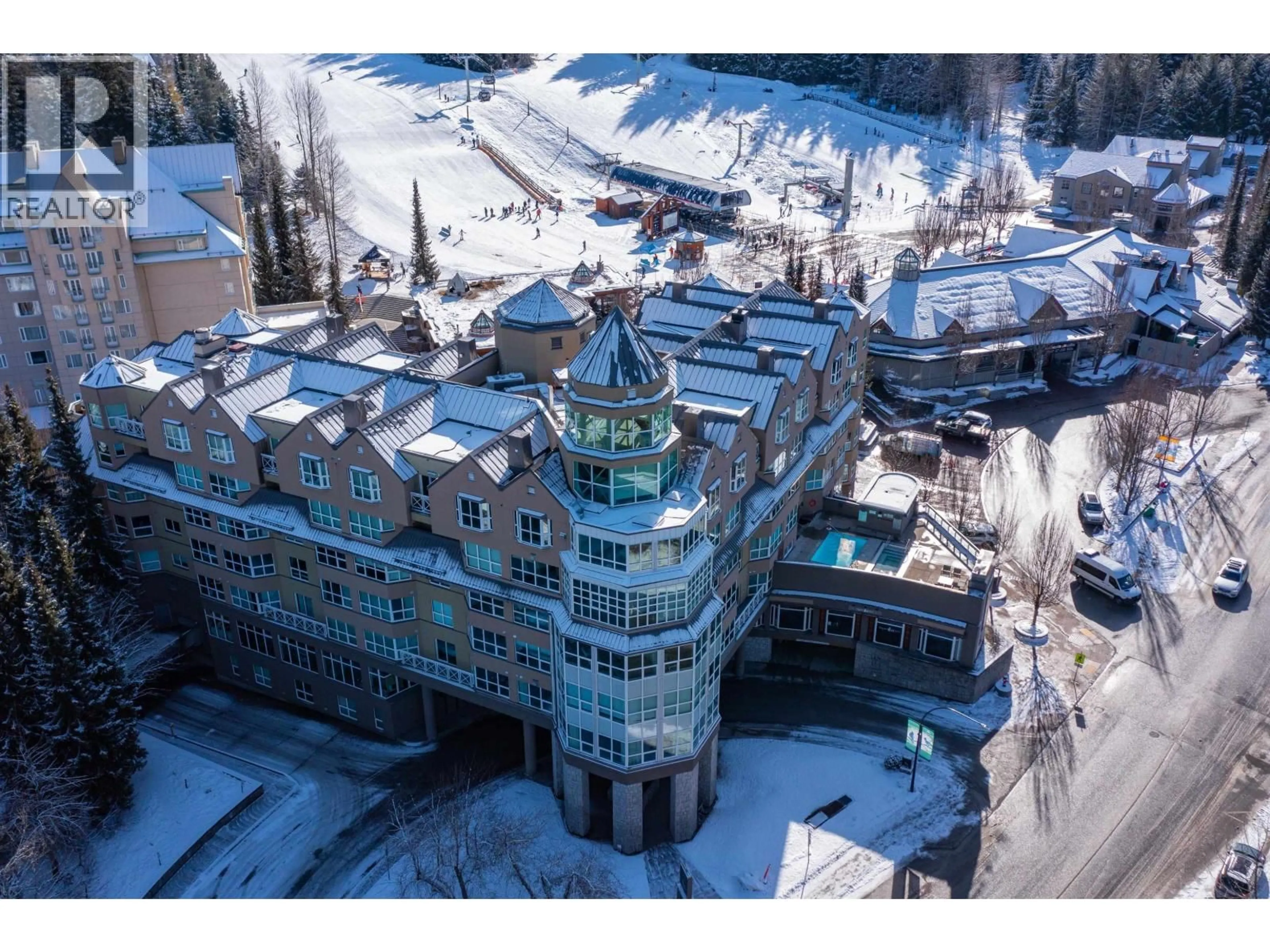 A pic from outside/outdoor area/front of a property/back of a property/a pic from drone, building for 401 - 4557 BLACKCOMB WAY, Whistler British Columbia V8E0Y2