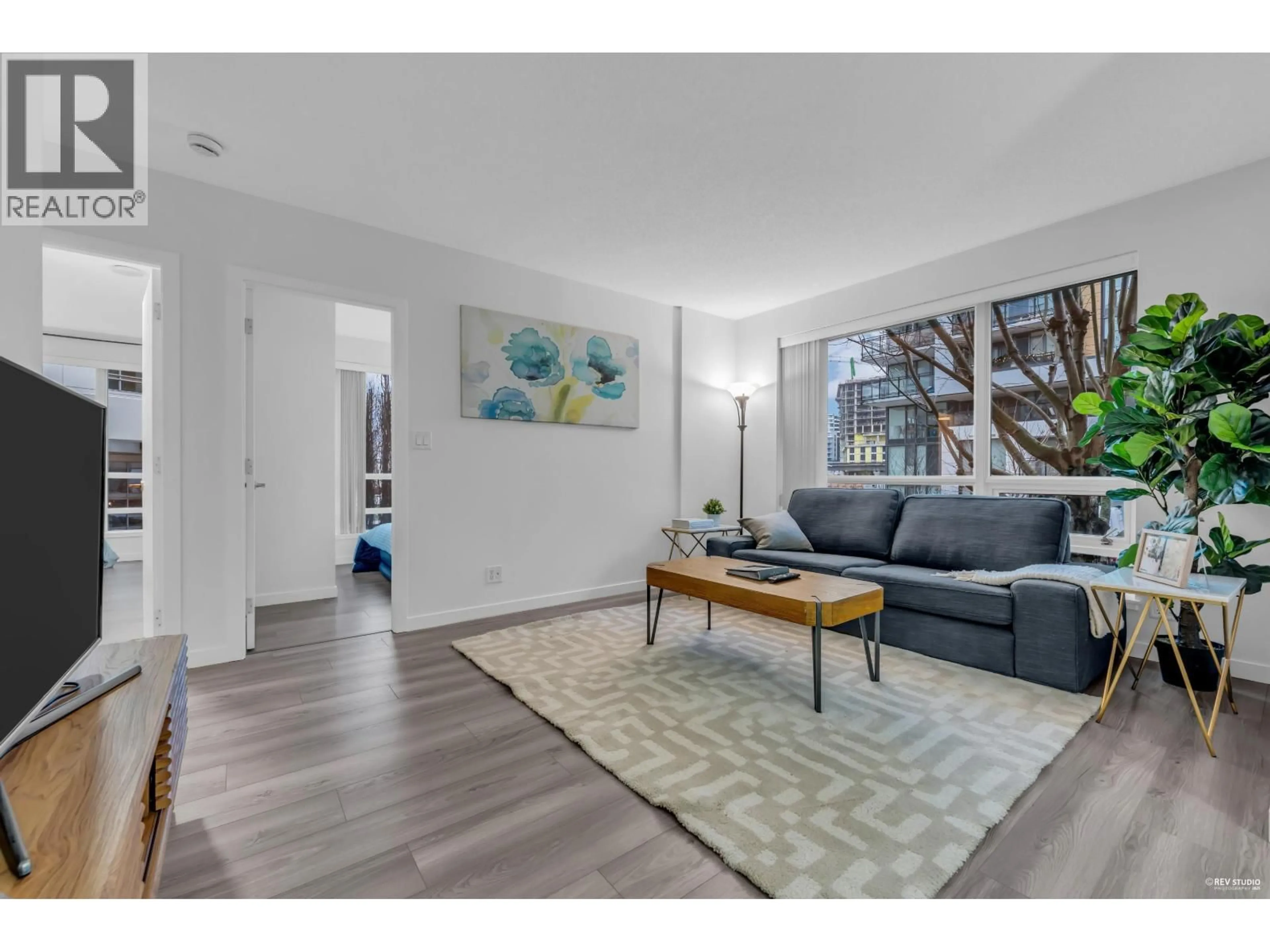 Living room with furniture, unknown for 201 - 3111 CORVETTE WAY, Richmond British Columbia V6X4K3