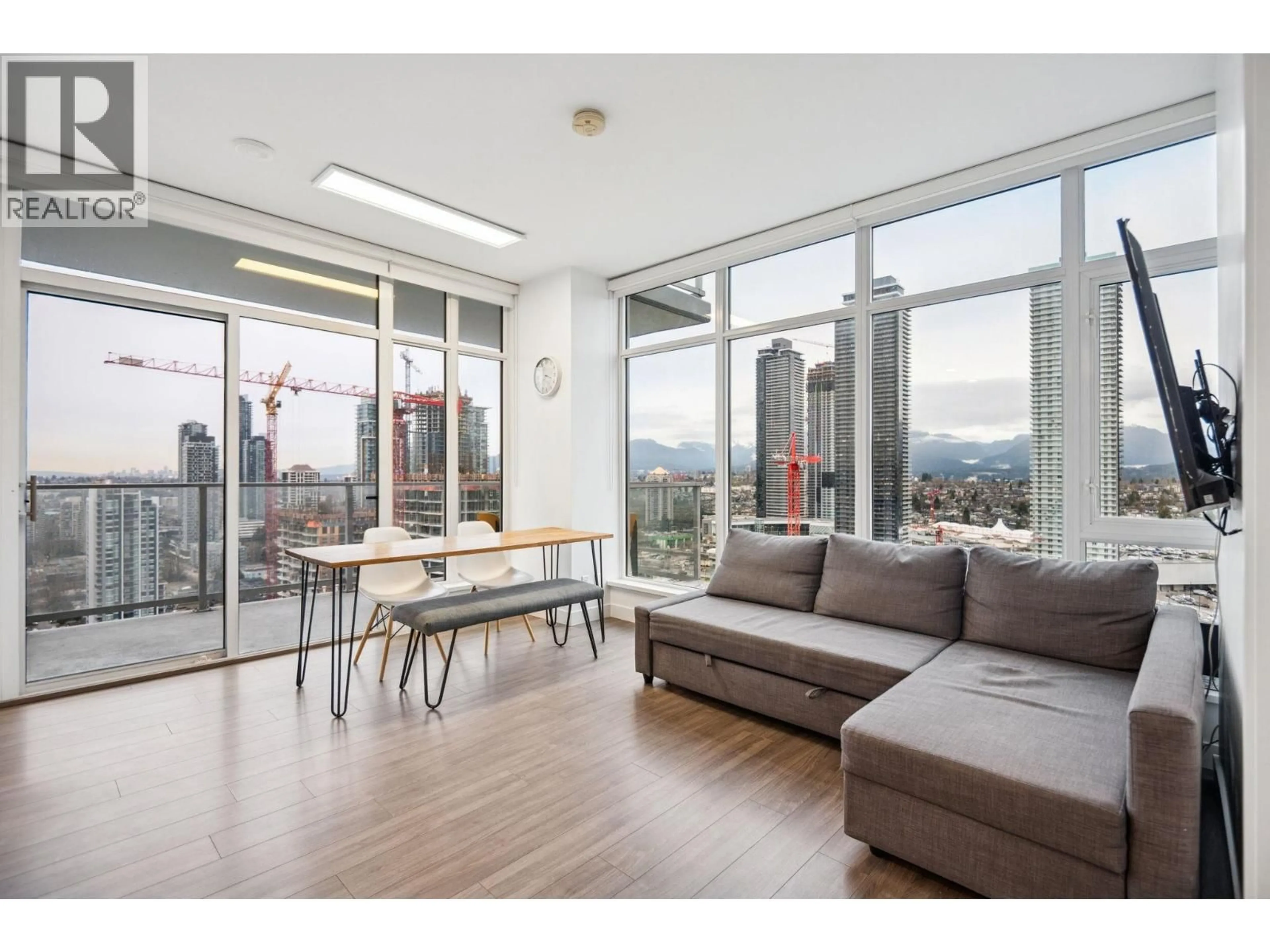 Living room with furniture, wood/laminate floor for 3207 - 2311 BETA AVENUE, Burnaby British Columbia V5C0M1
