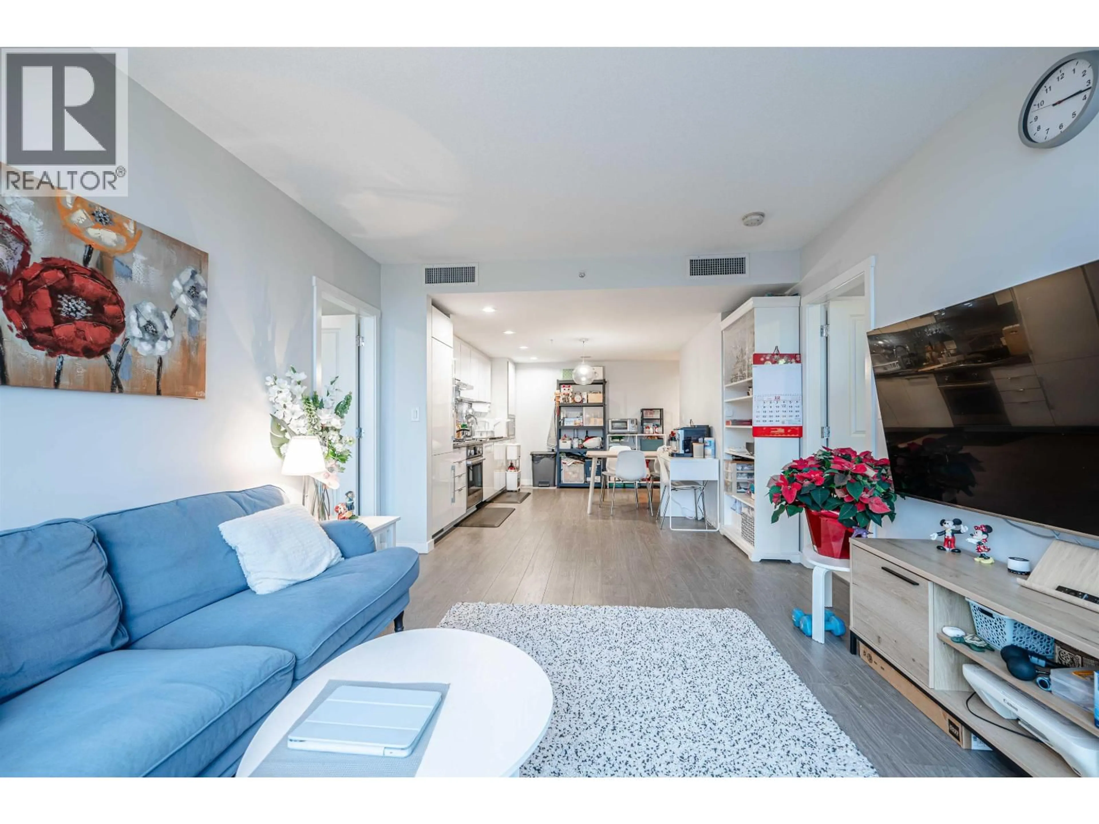 Living room with furniture, wood/laminate floor for 513 - 8333 SWEET AVENUE, Richmond British Columbia V6X0P4