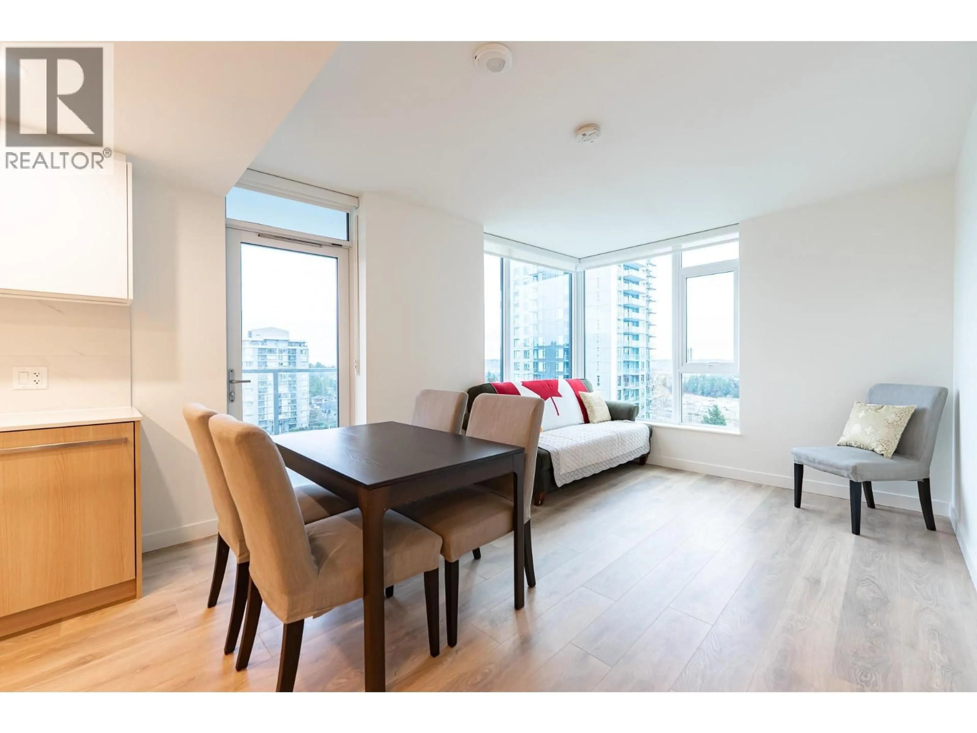 Living room with furniture, wood/laminate floor for 1204 - 318 ALDERSON AVENUE, Coquitlam British Columbia V3K0J1