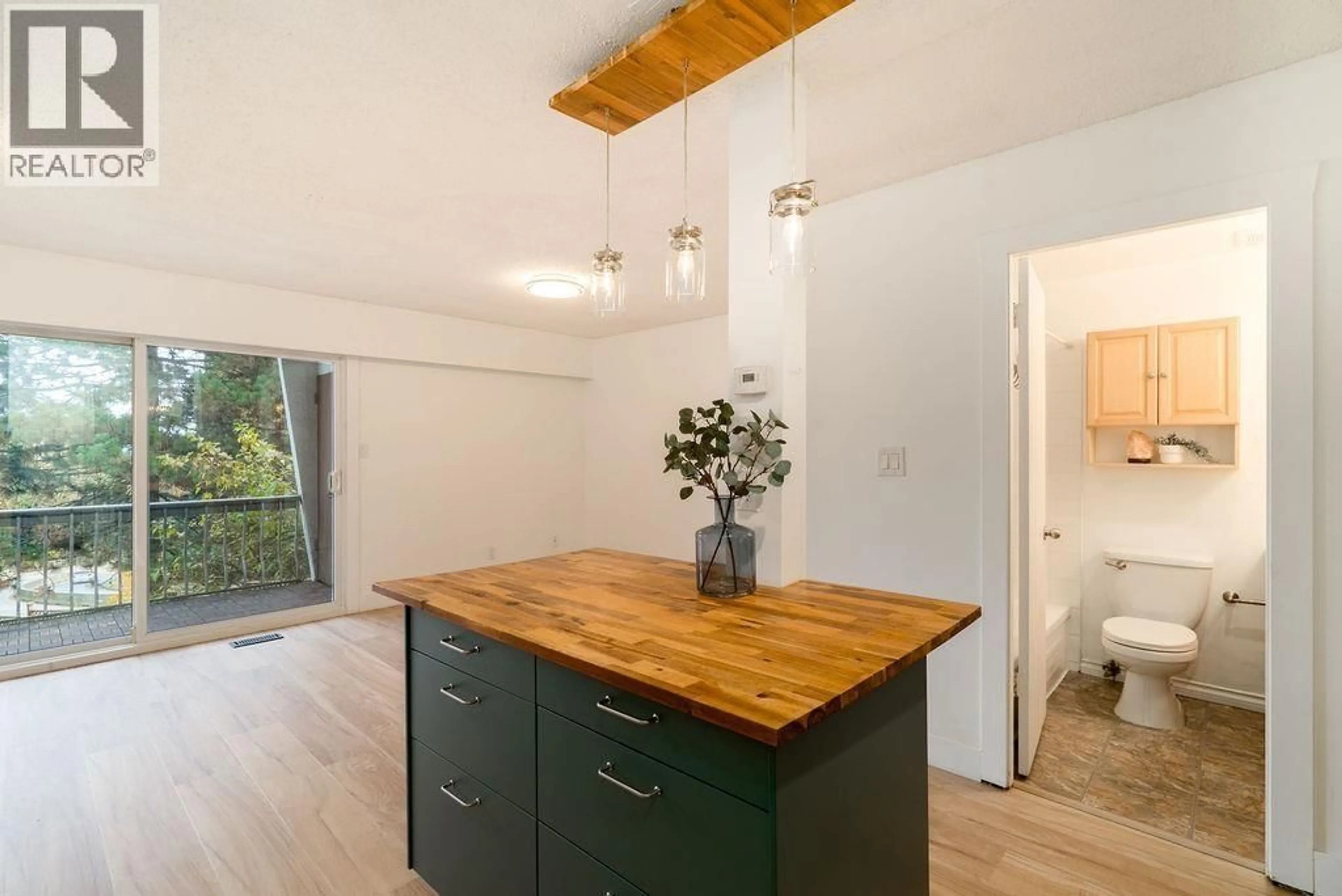 Open concept kitchen, wood/laminate floor for 1009 CLARKE ROAD, Port Moody British Columbia V3H1M3