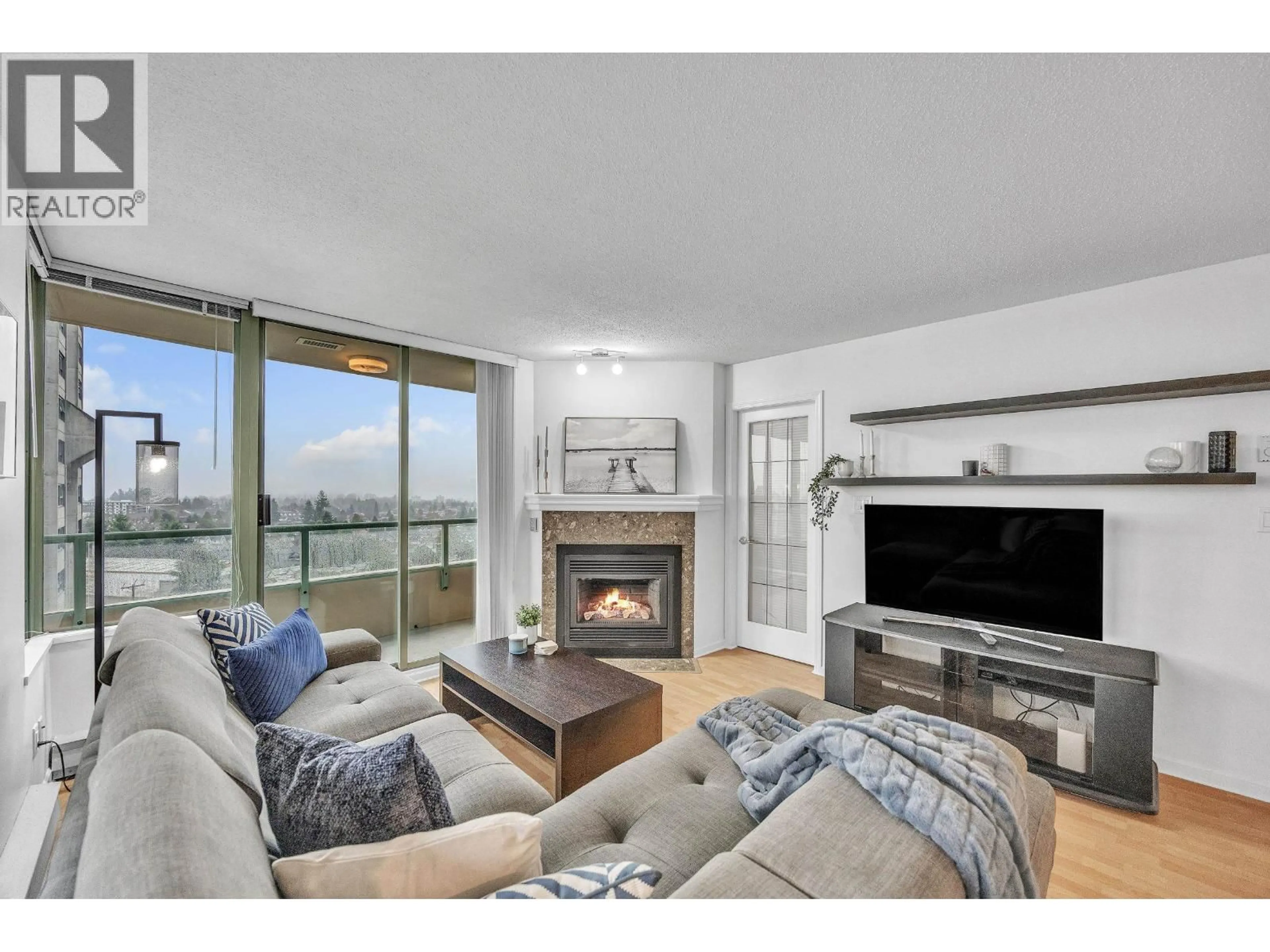 Living room with furniture, wood/laminate floor for 1140 - 7288 ACORN AVENUE, Burnaby British Columbia V5E4H6