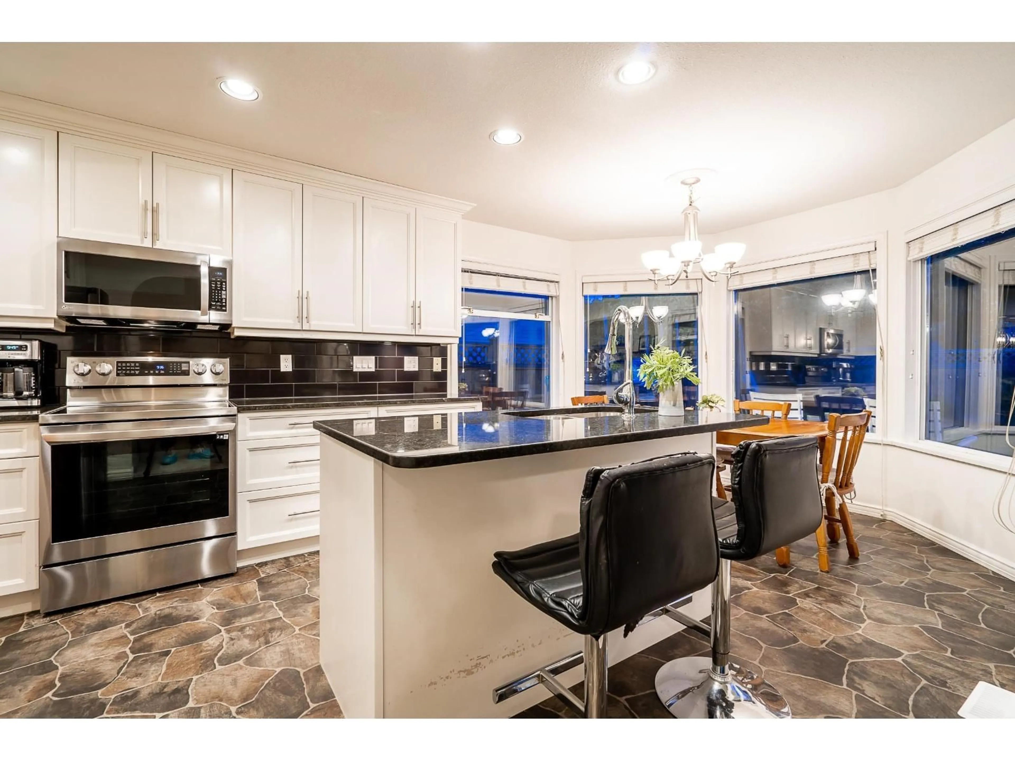 Open concept kitchen, ceramic/tile floor for 6116 185B STREET, Surrey British Columbia V3S7P6
