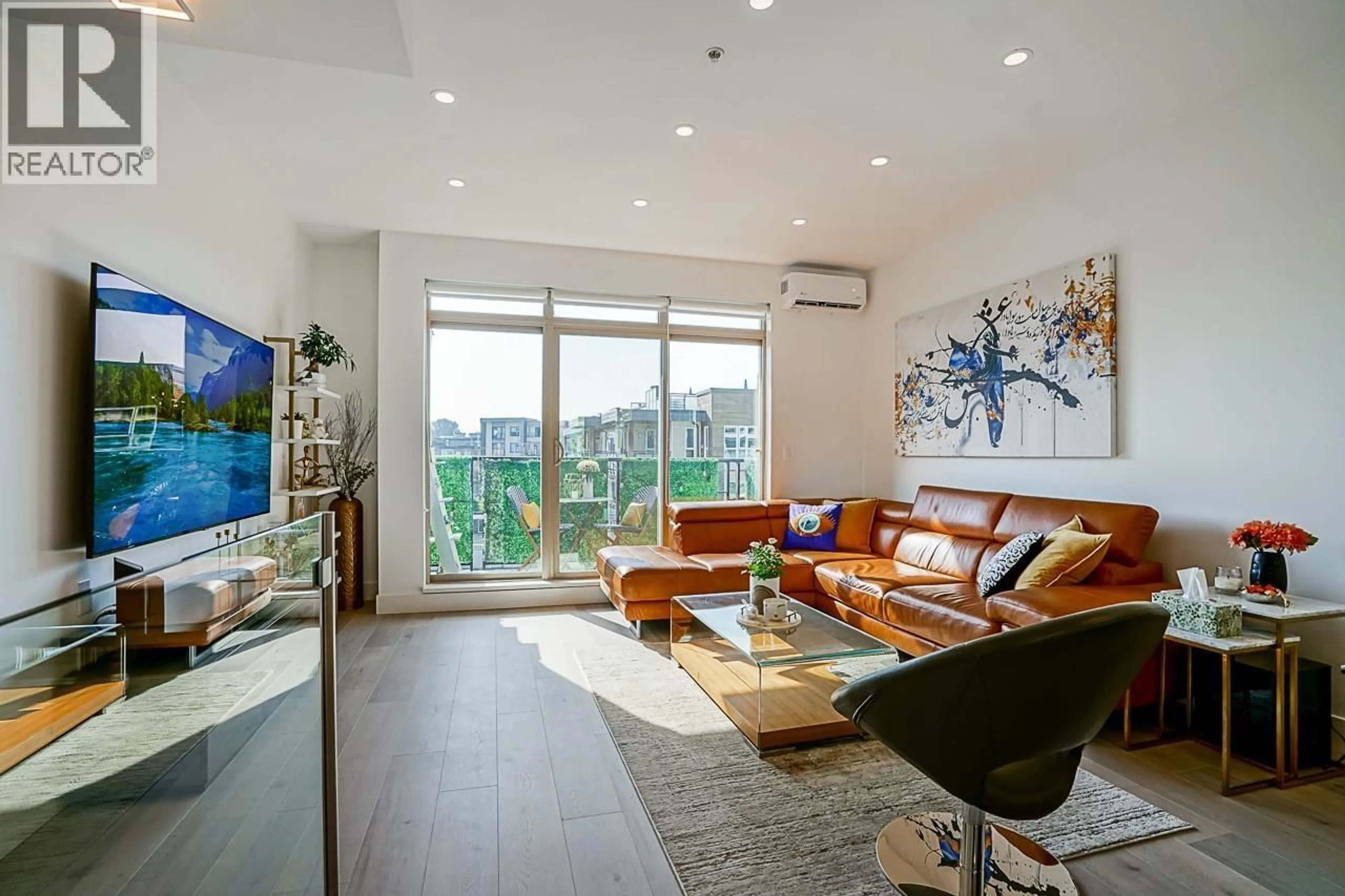 Living room with furniture, wood/laminate floor for 76 - 728 14TH STREET, North Vancouver British Columbia V7M0A8