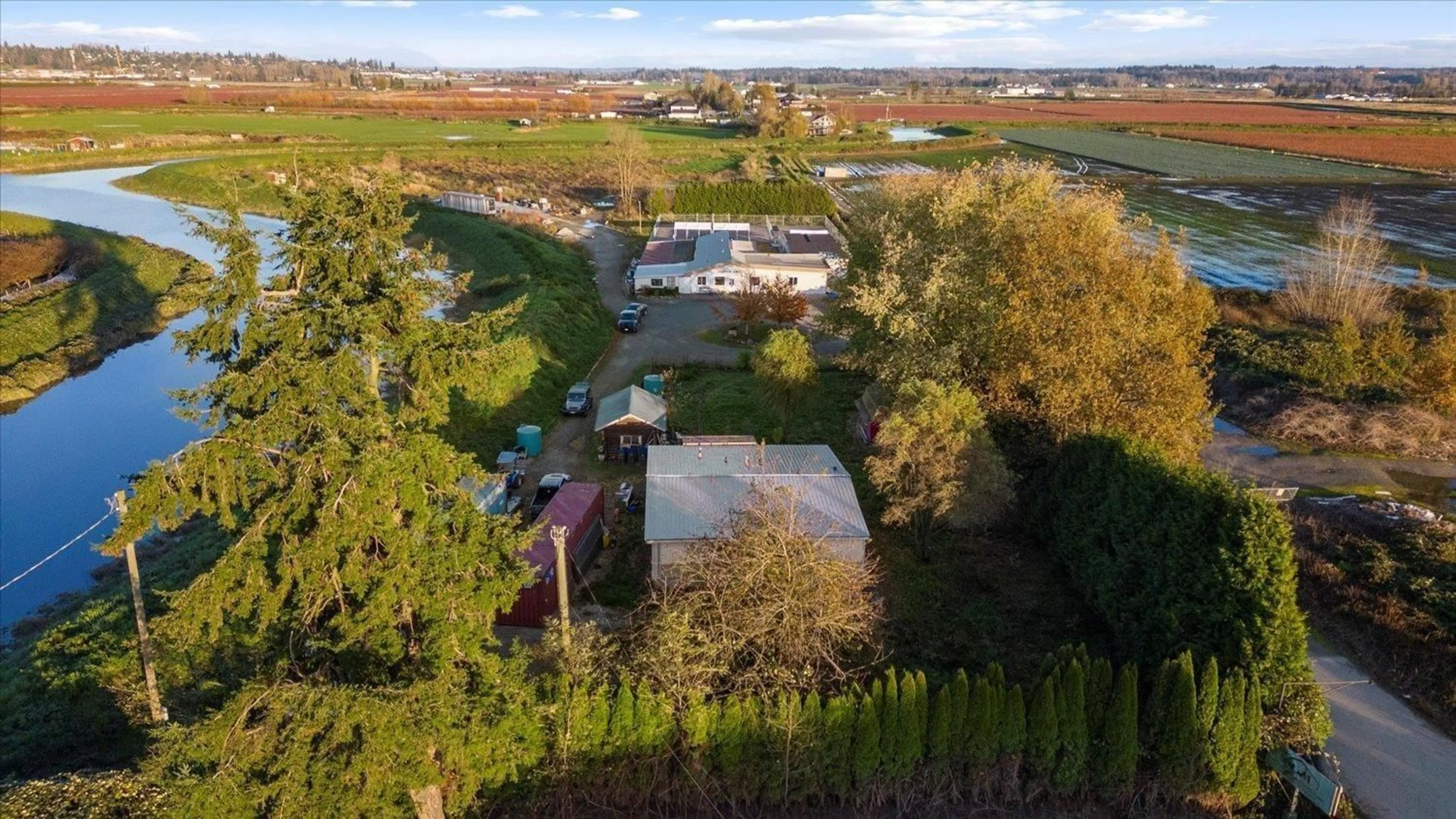 A pic from outside/outdoor area/front of a property/back of a property/a pic from drone, water/lake/river/ocean view for 4806 168 STREET, Surrey British Columbia V3S0L2