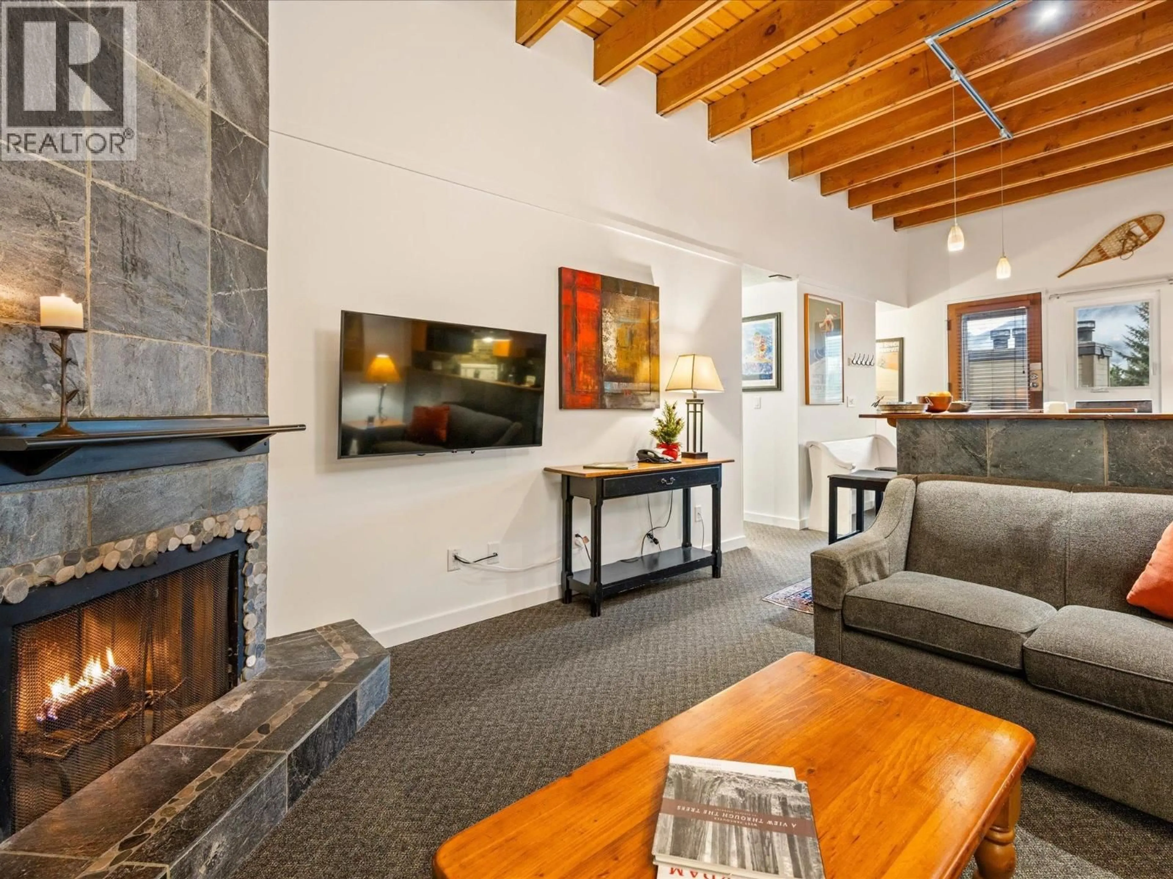 Living room with furniture, unknown for 515 - 4200 WHISTLER WAY, Whistler British Columbia V8E1J4