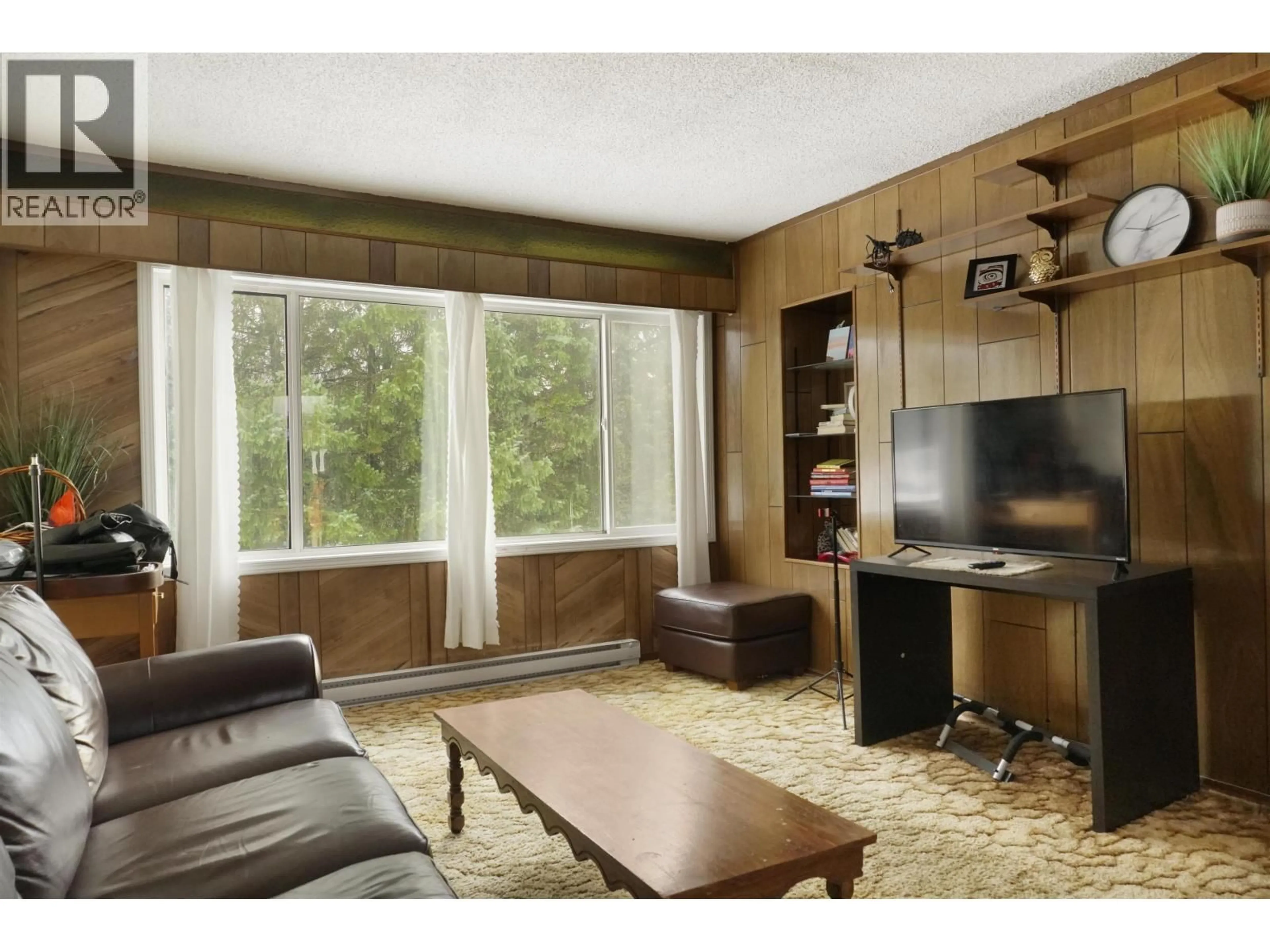 Living room with furniture, wood/laminate floor for 19 WIDGEON STREET, Kitimat British Columbia V8C1L4