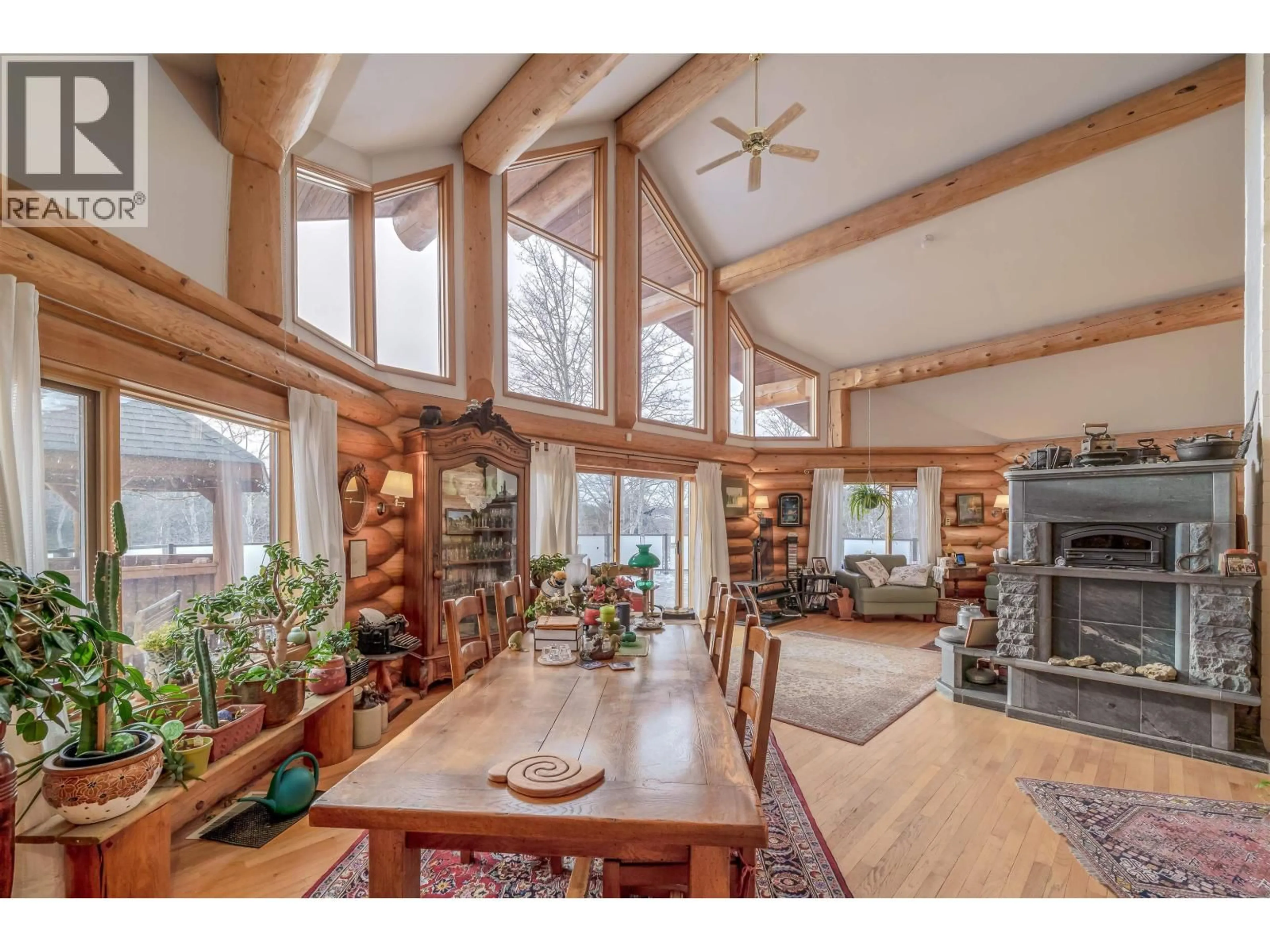 Dining room, wood/laminate floor for 5565 BACKVALLEY ROAD, 100 Mile House British Columbia V0K2E1