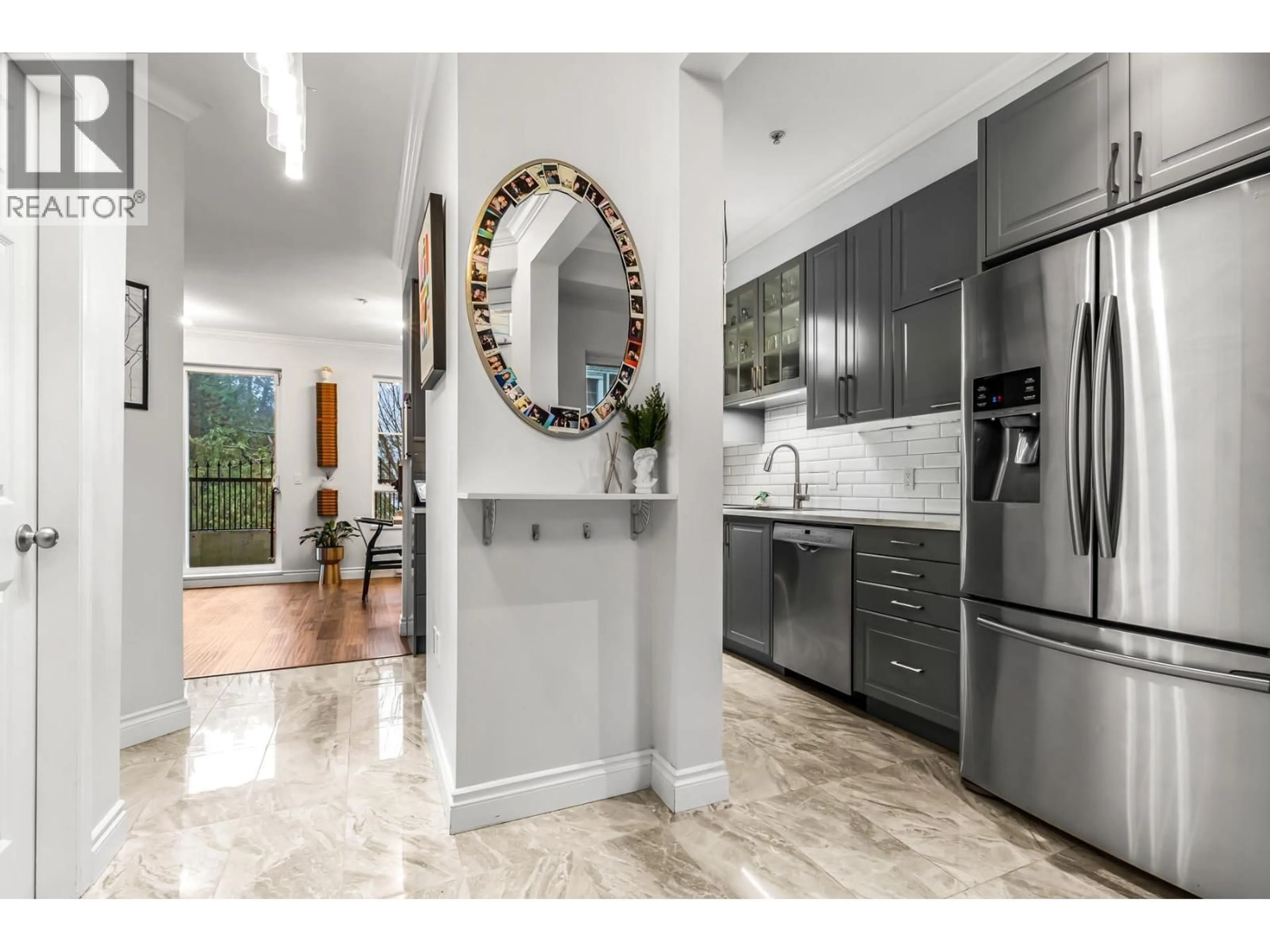 Open concept kitchen, ceramic/tile floor for 204 - 815 FIRST STREET, New Westminster British Columbia V3L2H7