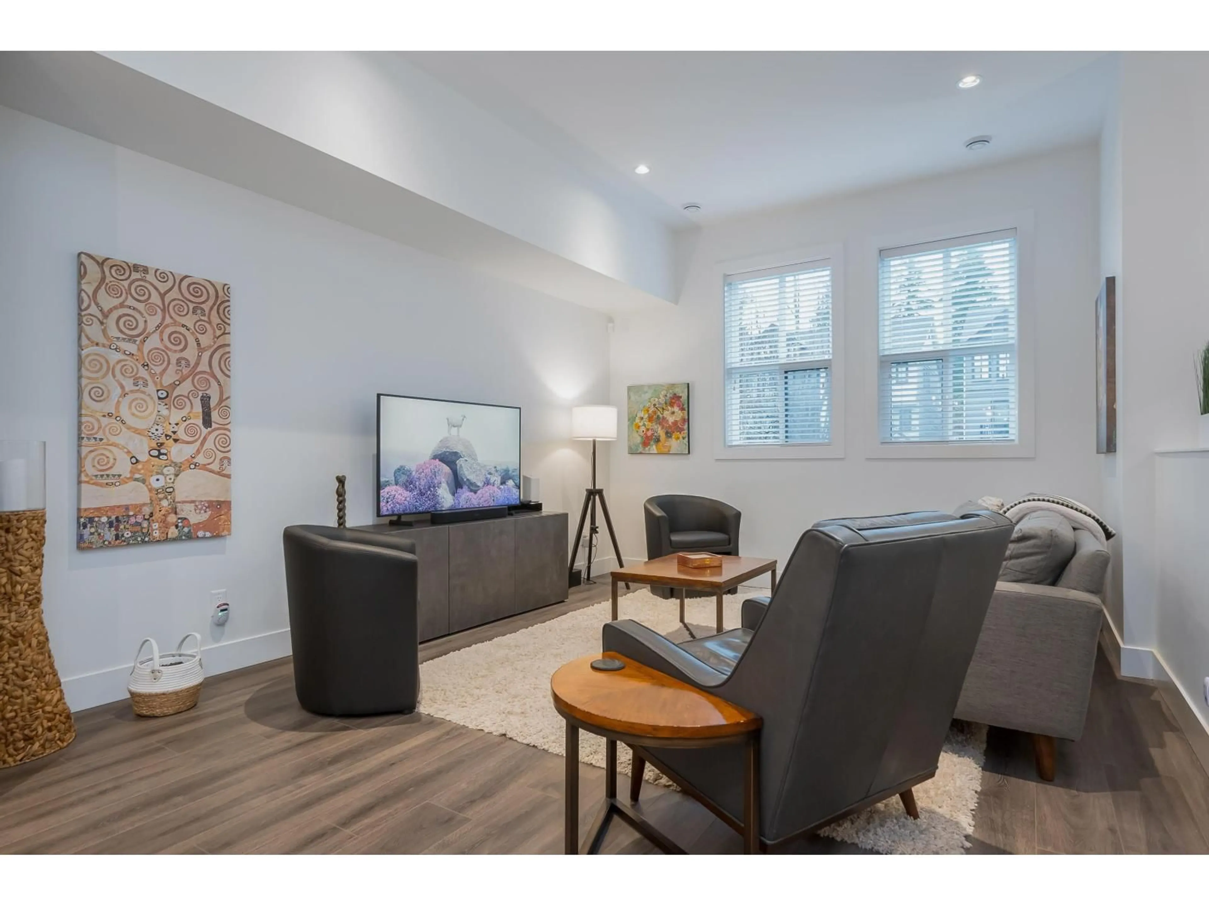 Living room with furniture, wood/laminate floor for 8141 202 STREET, Langley British Columbia V2Y3K2