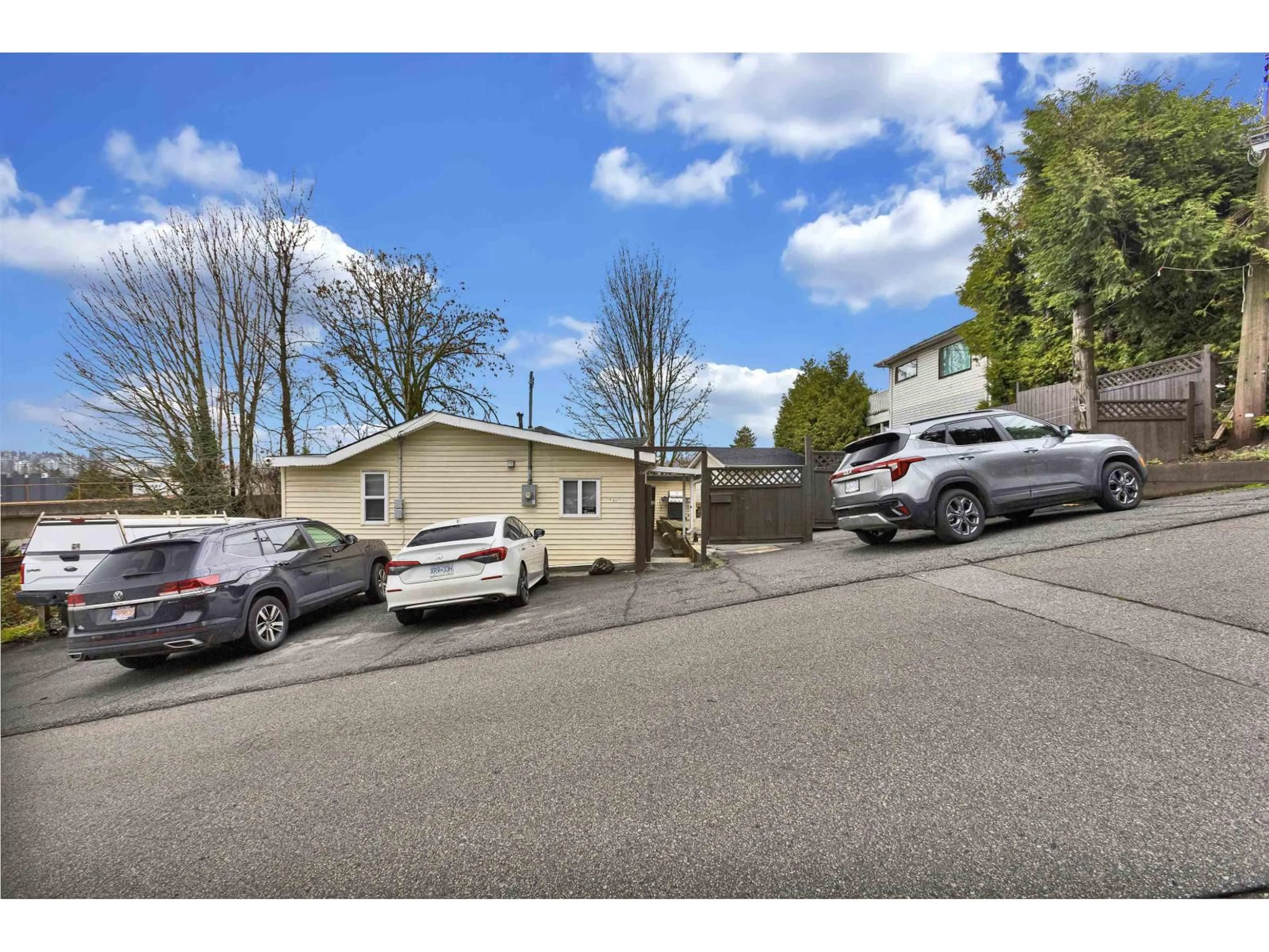 A pic from outside/outdoor area/front of a property/back of a property/a pic from drone, street for 12943 112 AVENUE, Surrey British Columbia V3T2S6