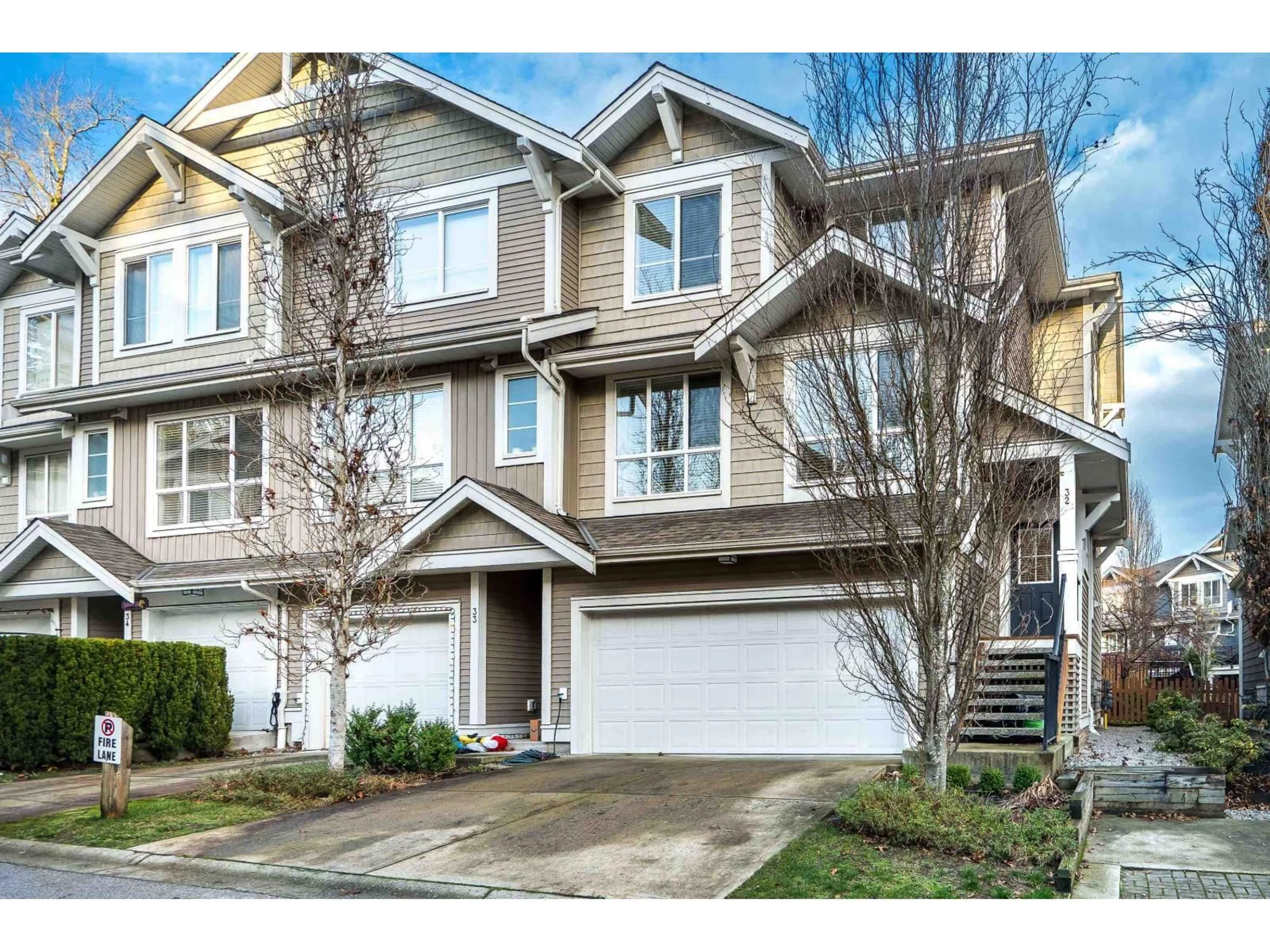 Home with vinyl exterior material, street for 32 - 7059 210 STREET, Langley British Columbia V2Y0T2