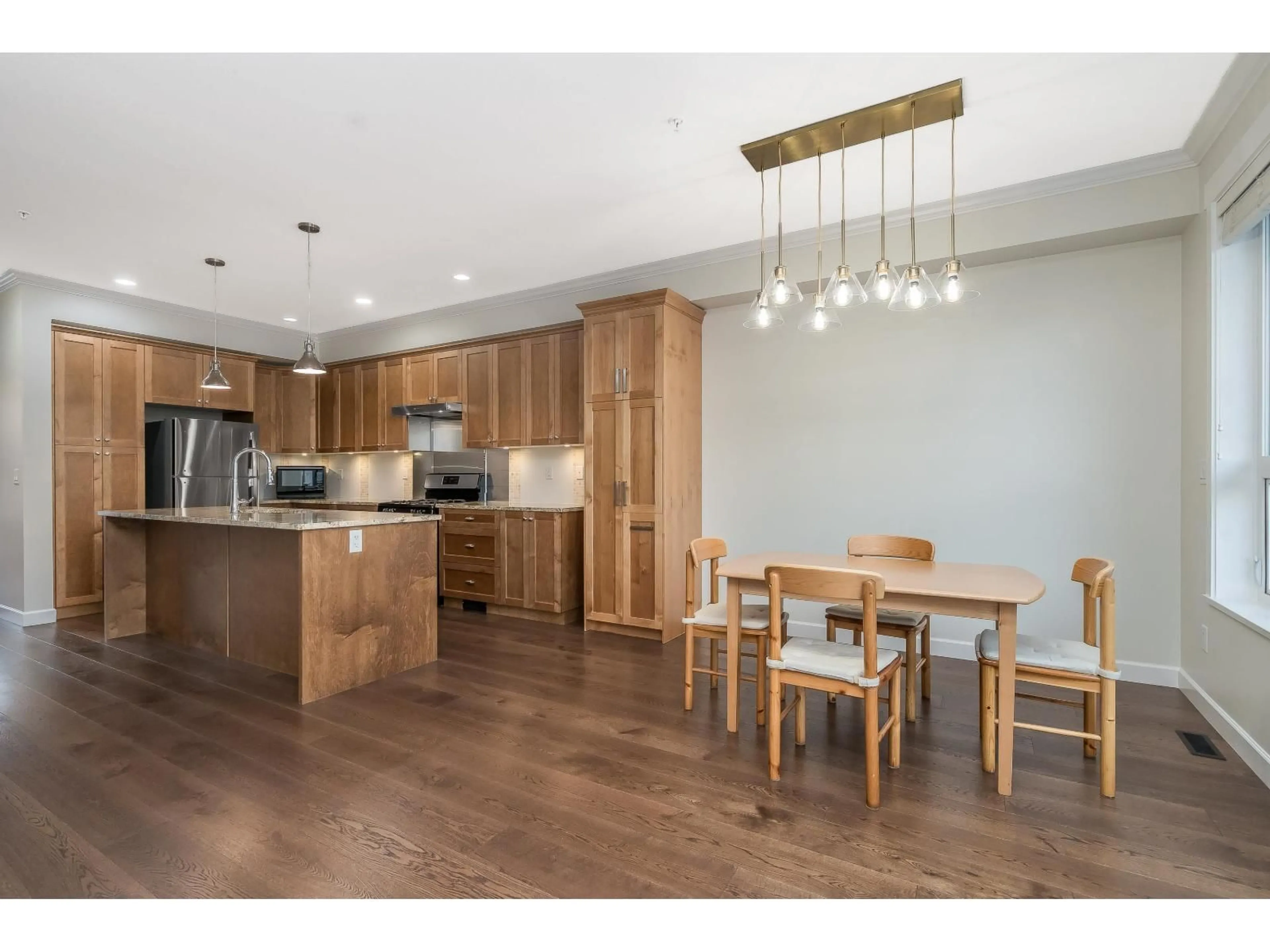 Open concept kitchen, wood/laminate floor for 32 - 7059 210 STREET, Langley British Columbia V2Y0T2