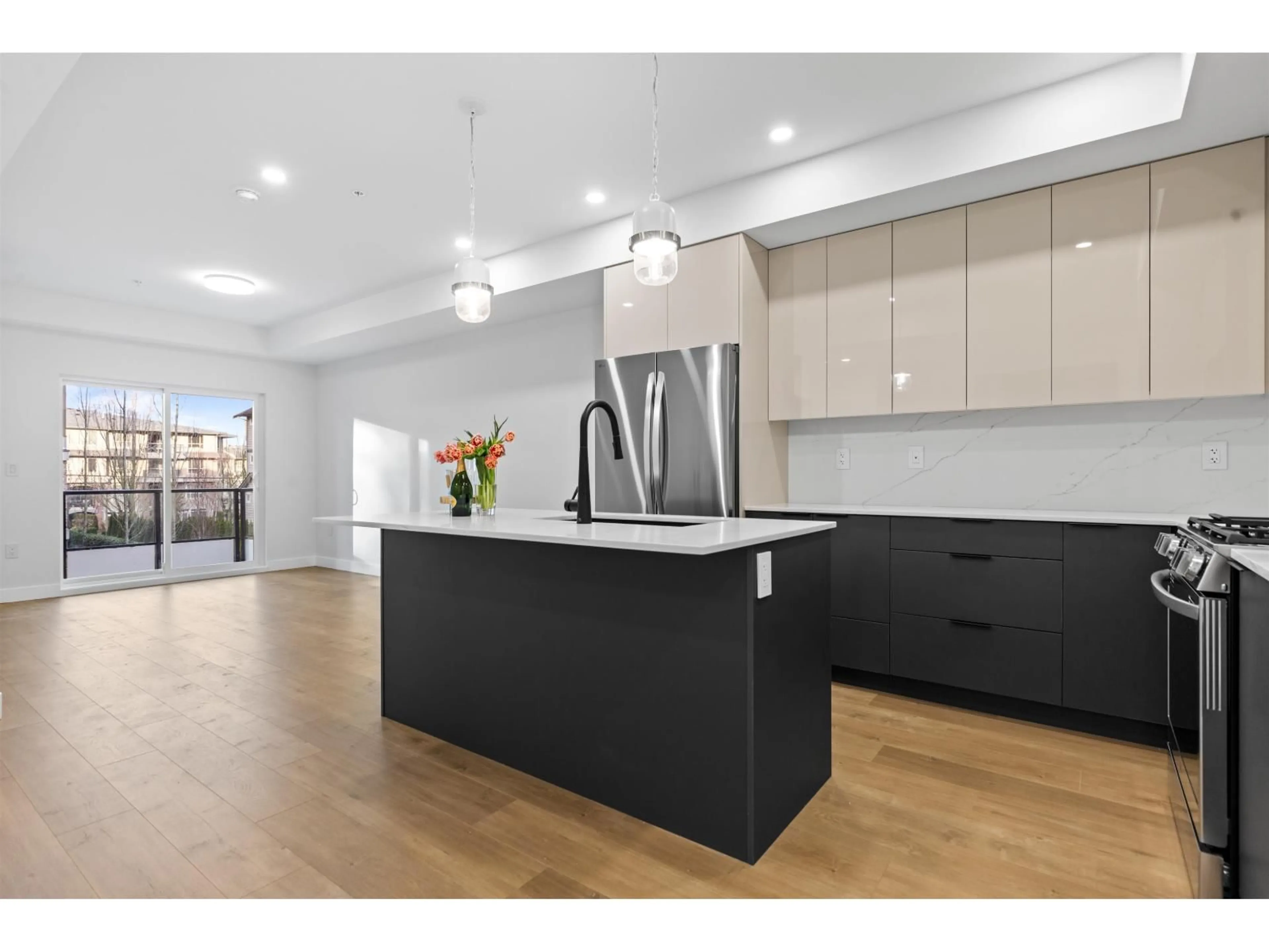 Open concept kitchen, unknown for 201 - 15353 17 AVENUE, Surrey British Columbia V4A1T8