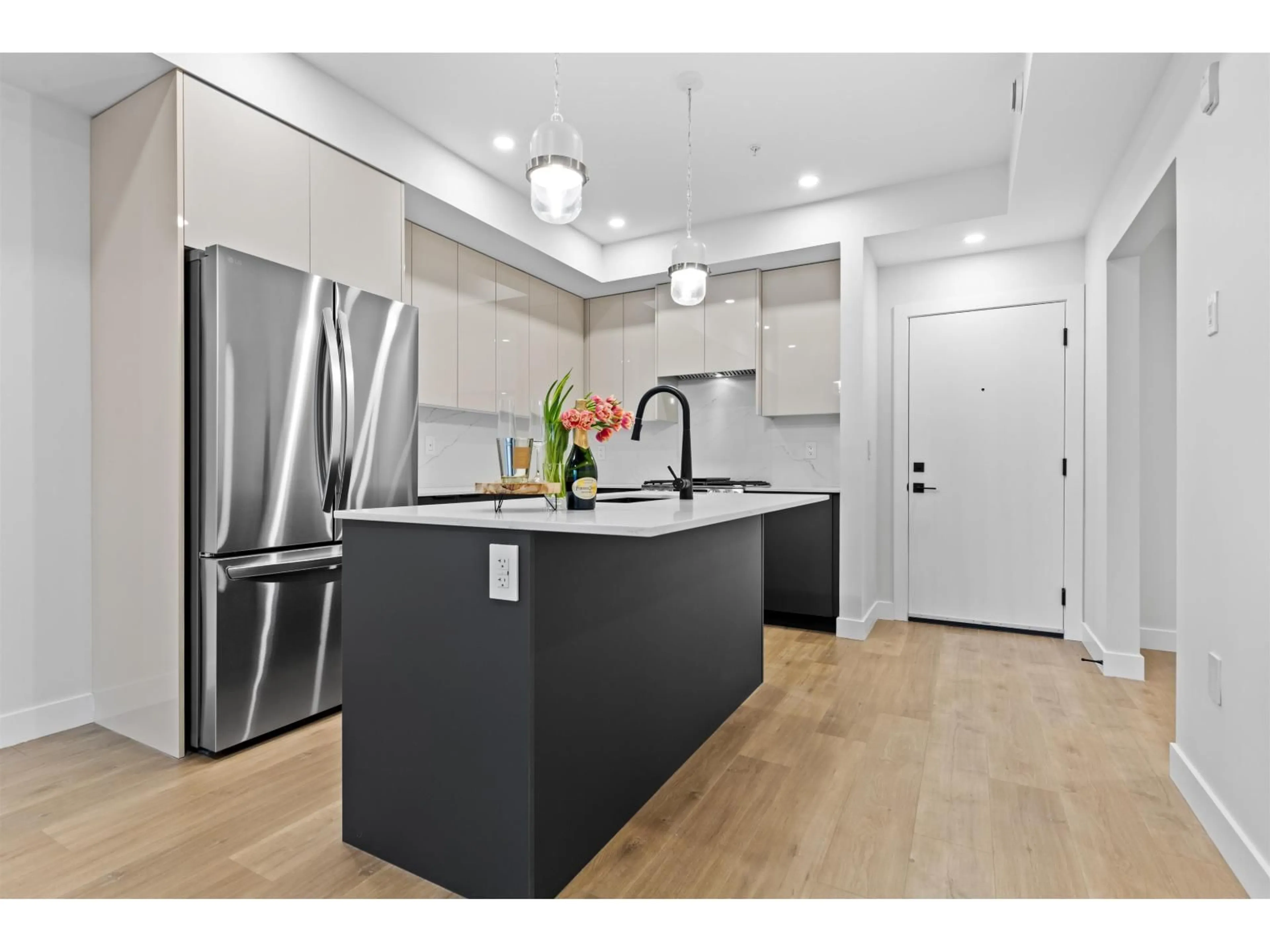 Open concept kitchen, unknown for 201 - 15353 17 AVENUE, Surrey British Columbia V4A1T8