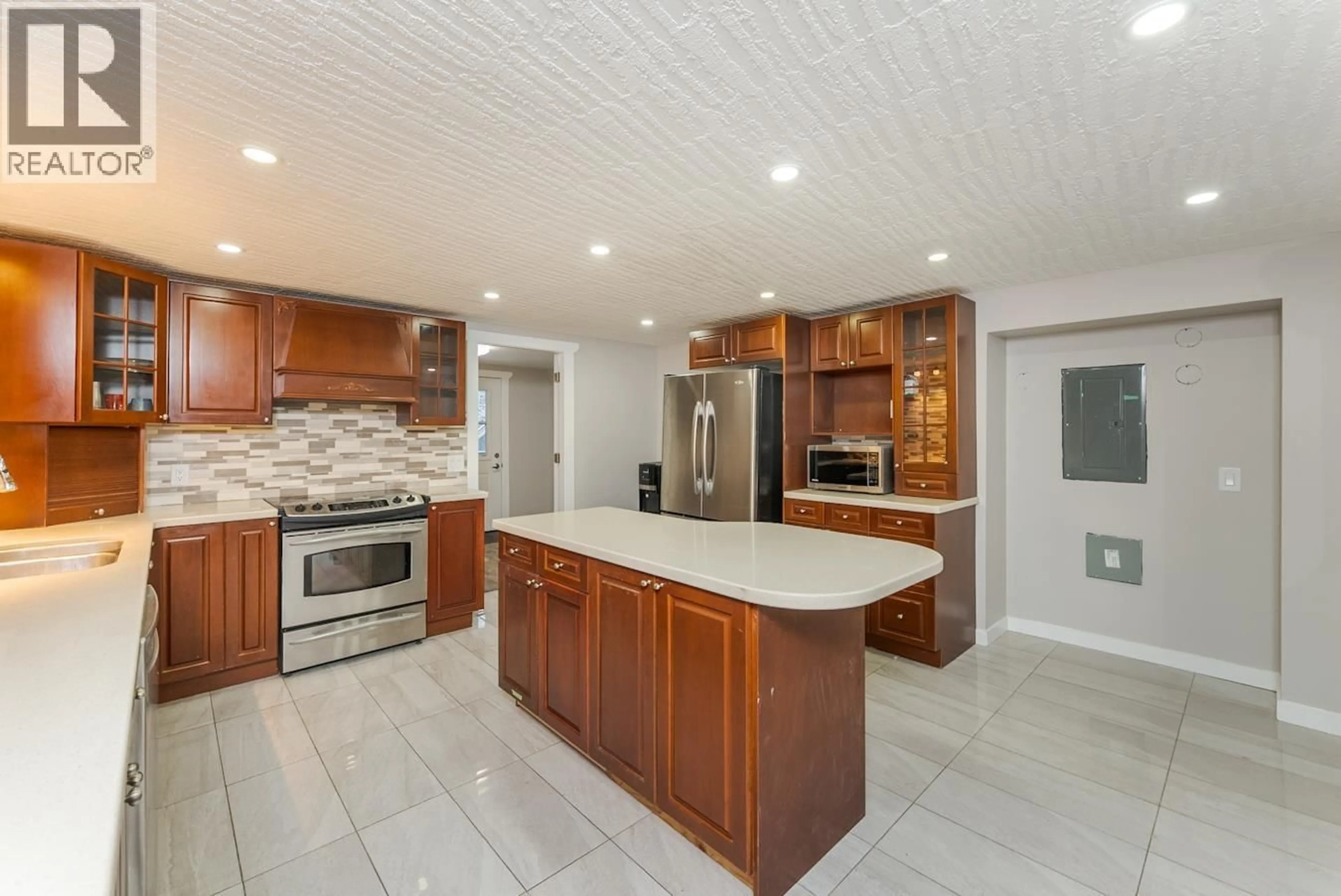 Open concept kitchen, ceramic/tile floor for 6315 CUMMINGS ROAD, Prince George British Columbia V2N5W1