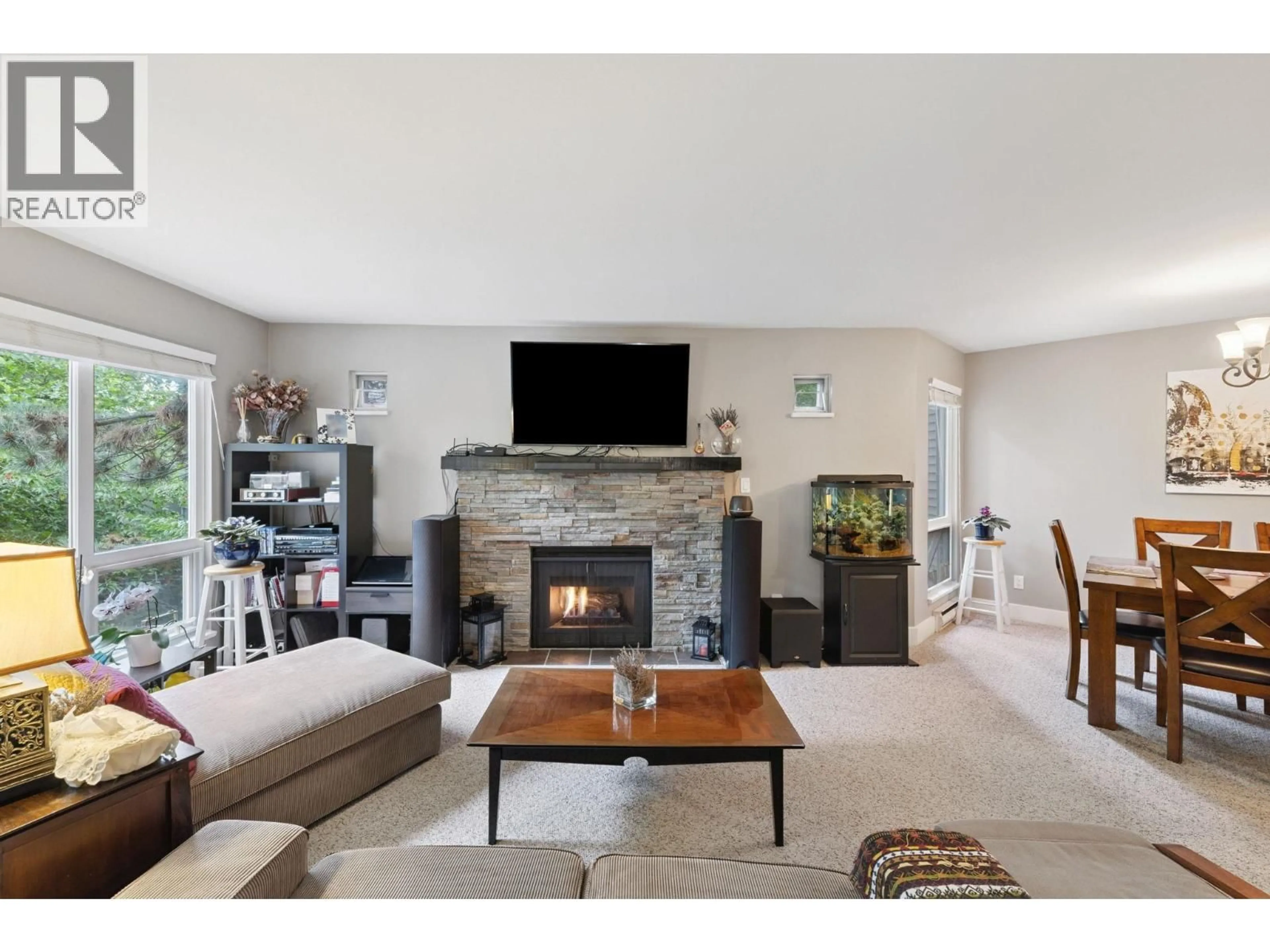 Living room with furniture, unknown for 206 - 7459 MOFFATT ROAD, Richmond British Columbia V6Y1X9