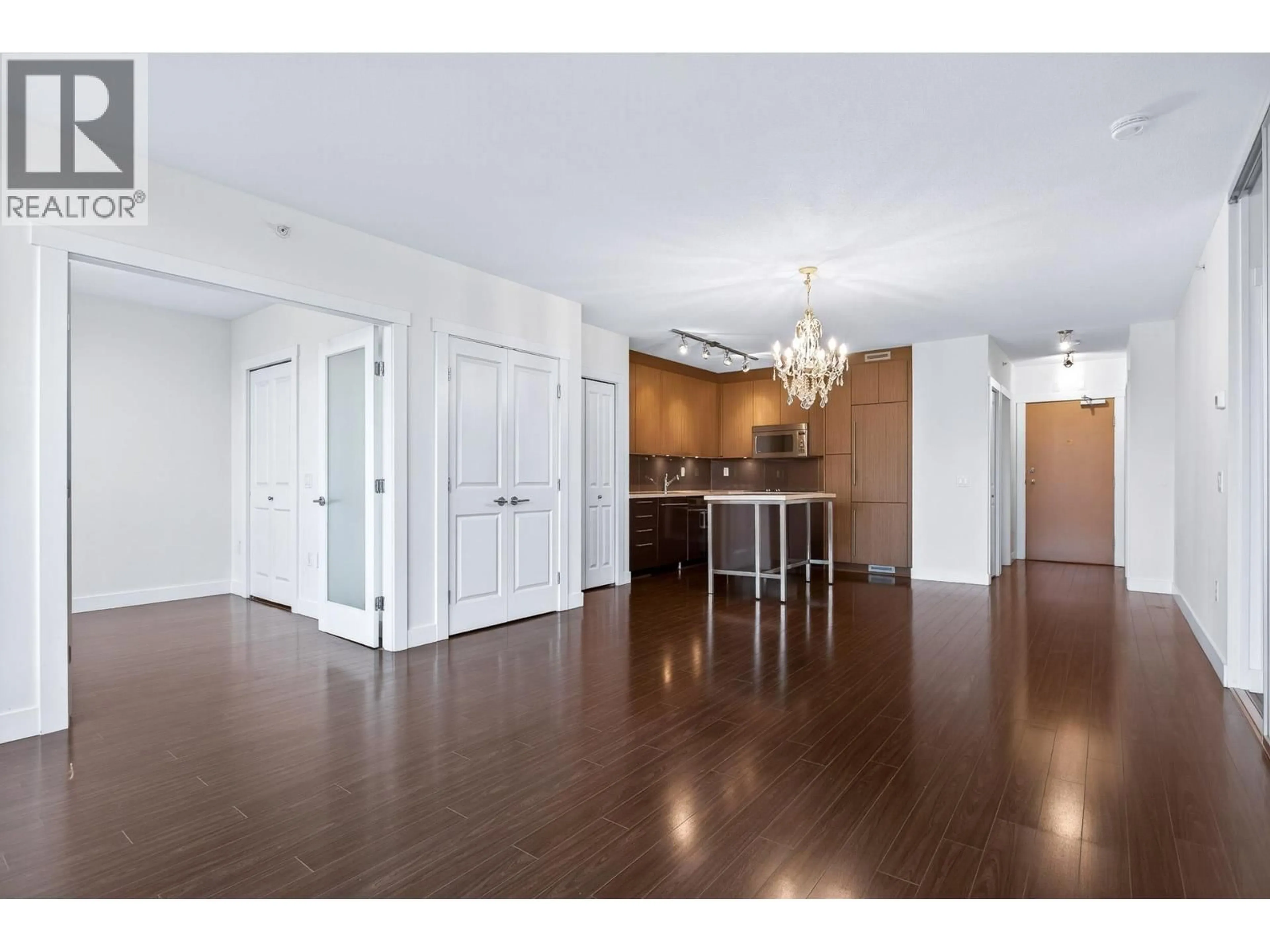 Open concept kitchen, wood/laminate floor for 502 - 1833 CROWE STREET, Vancouver British Columbia V5Y0A2