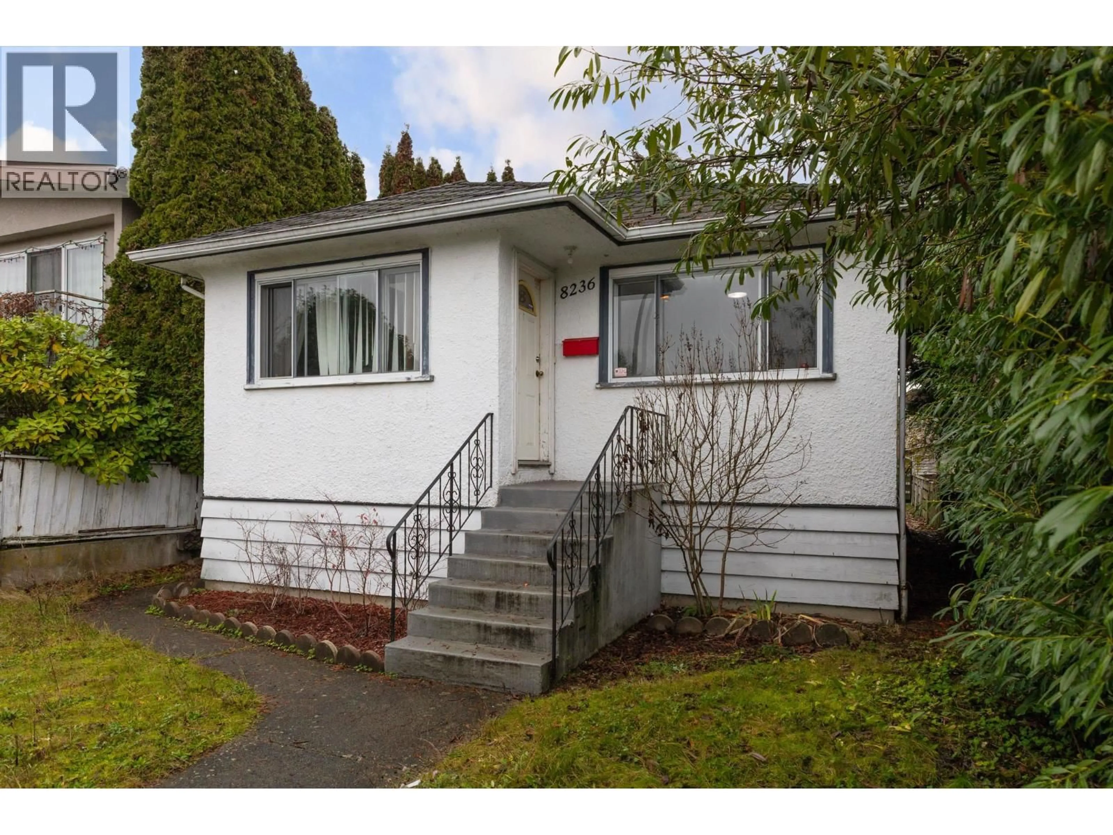 Home with vinyl exterior material, street for 8236 HAIG STREET, Vancouver British Columbia V6P4R9