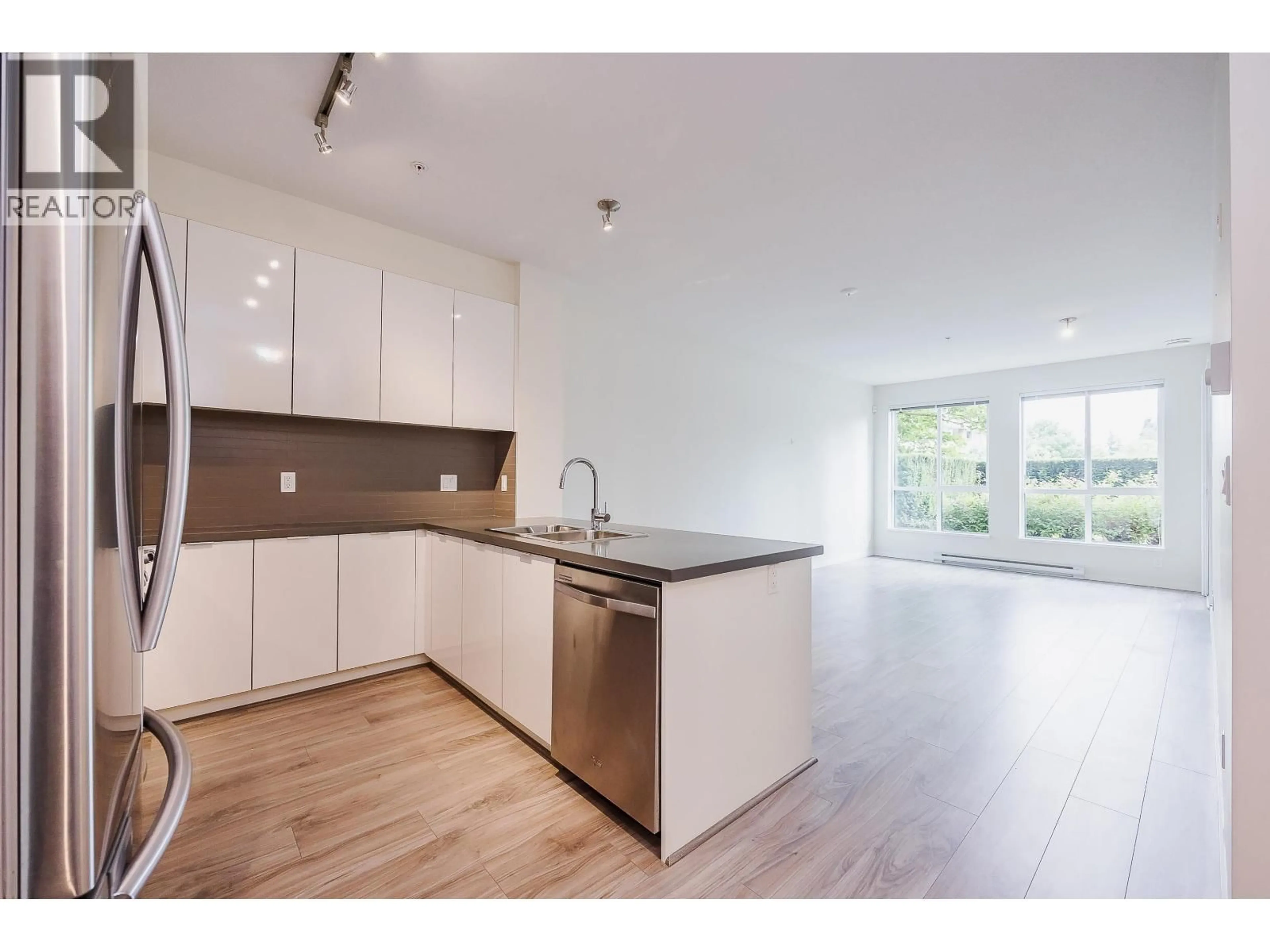 Open concept kitchen, wood/laminate floor for 103 - 1135 WINDSOR MEWS, Coquitlam British Columbia V3B0L2