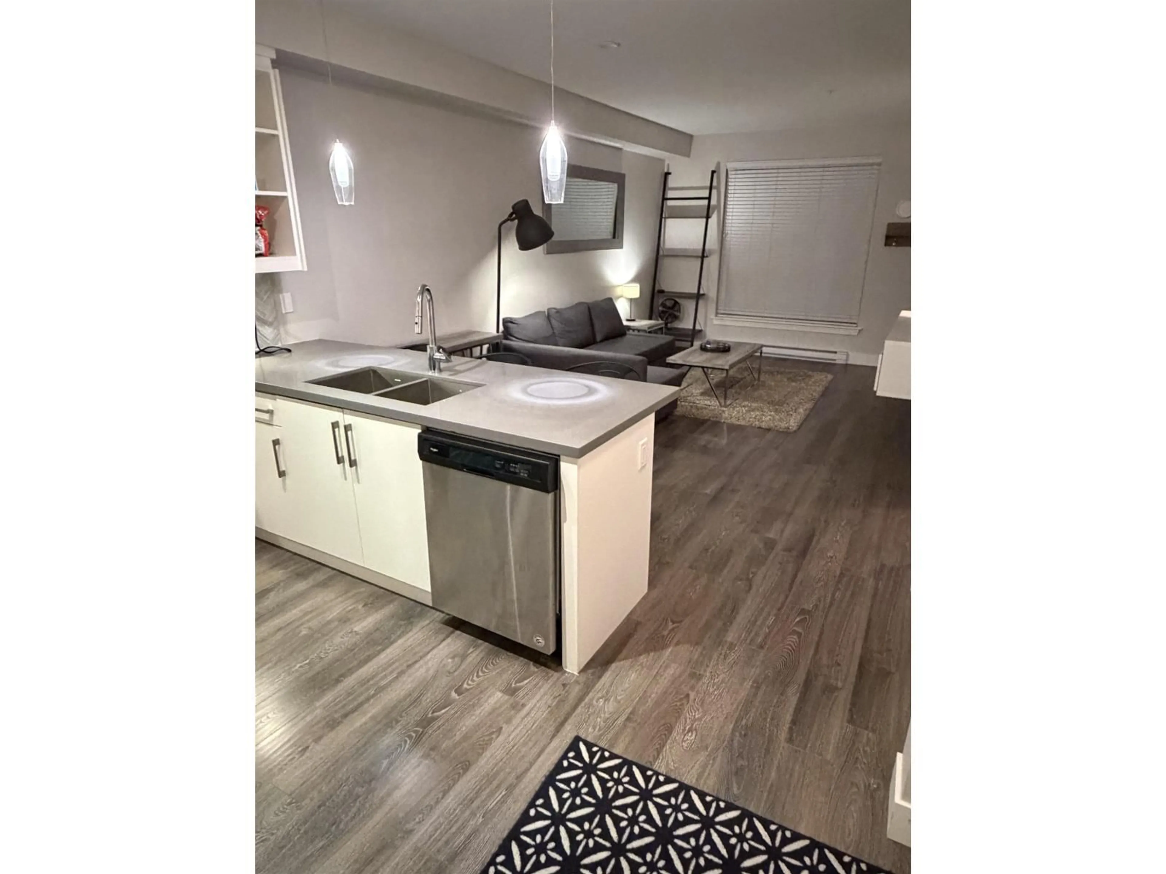 Open concept kitchen, wood/laminate floor for 102 - 14550 WINTER CRESCENT, Surrey British Columbia V4P0G4