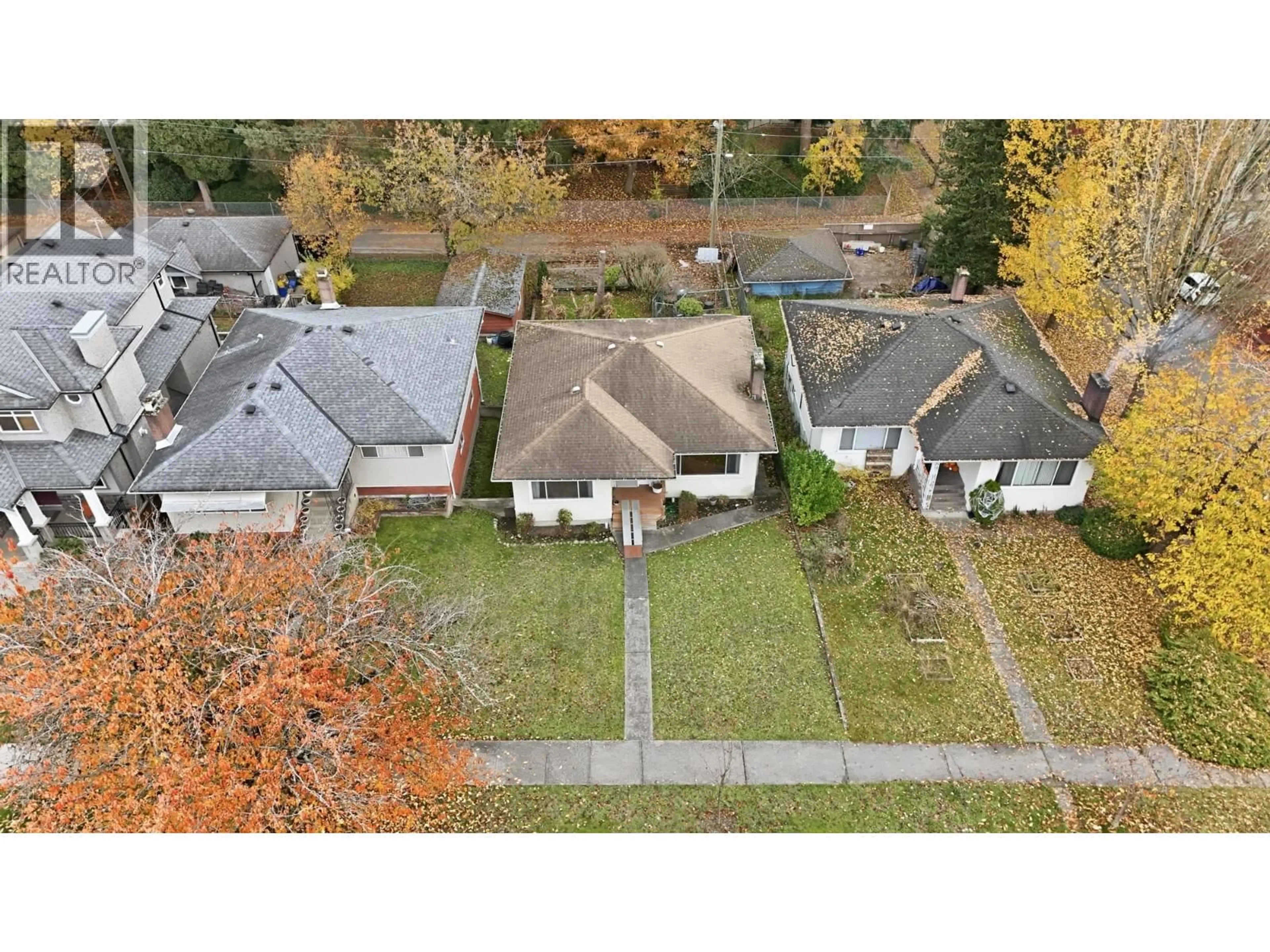 A pic from outside/outdoor area/front of a property/back of a property/a pic from drone, street for 5878 ARGYLE, Vancouver British Columbia V5P3J7