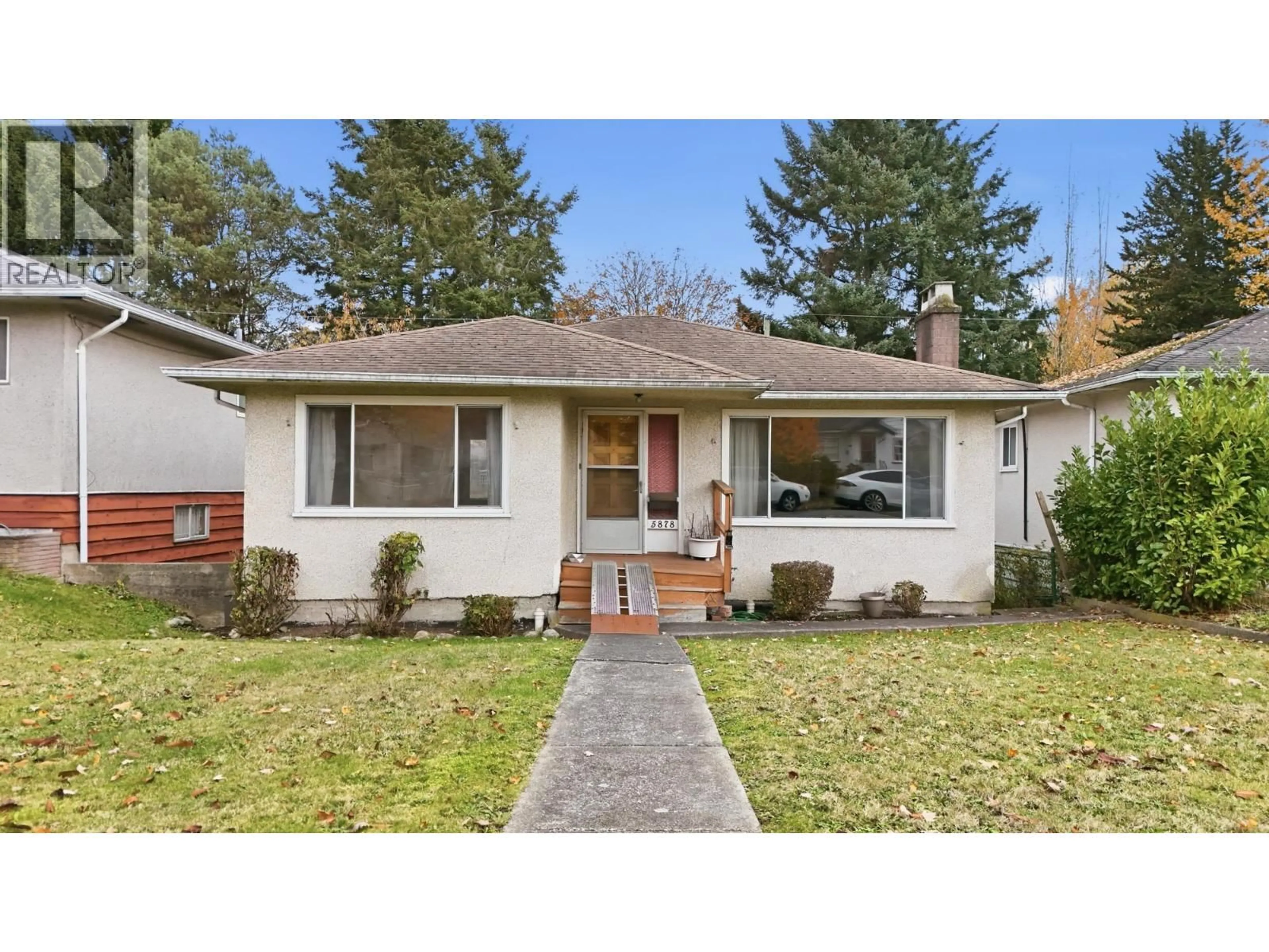 Home with vinyl exterior material, street for 5878 ARGYLE, Vancouver British Columbia V5P3J7