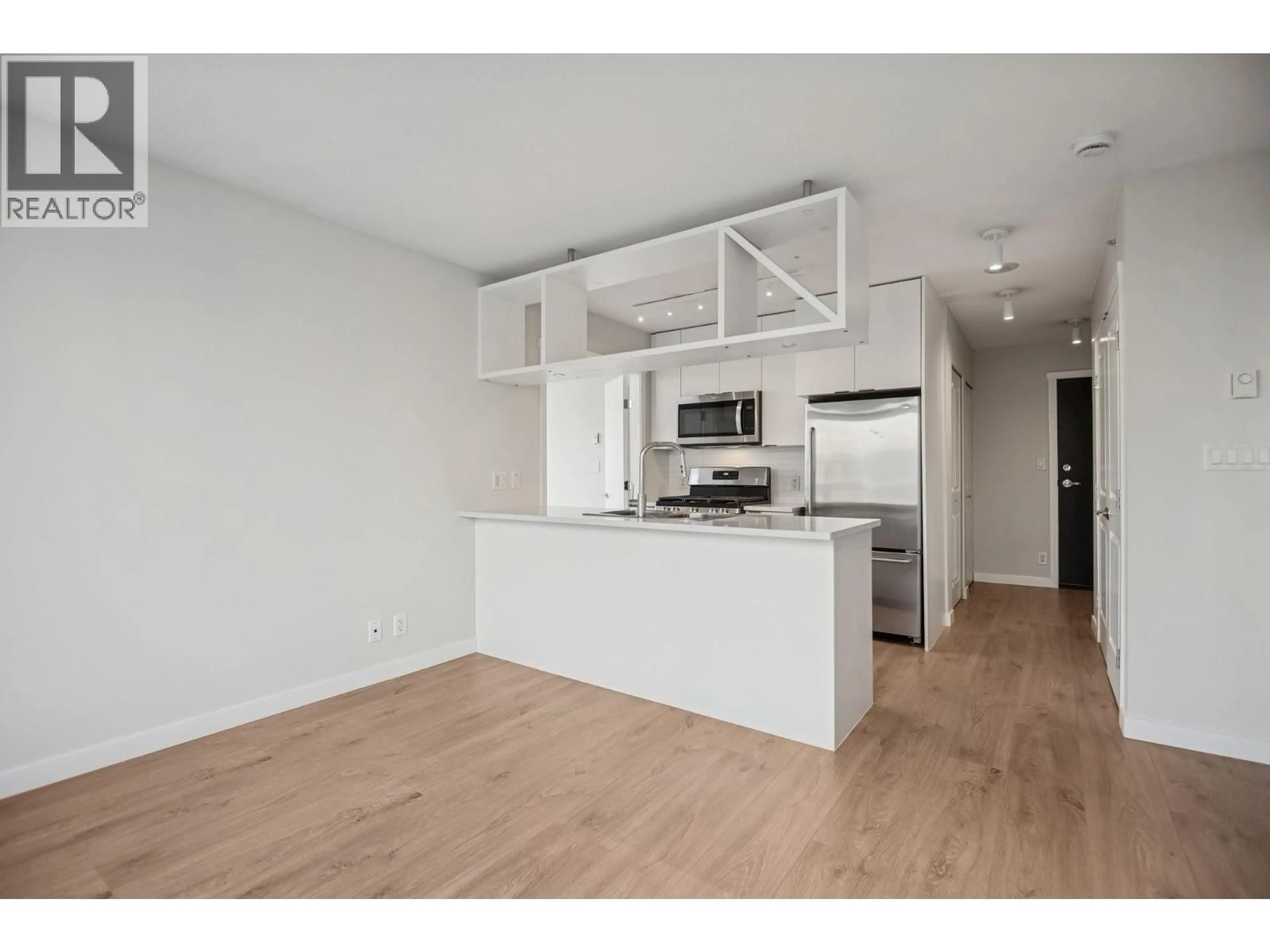 Open concept kitchen, wood/laminate floor for 2103 - 1001 RICHARDS STREET, Vancouver British Columbia V6B1J6