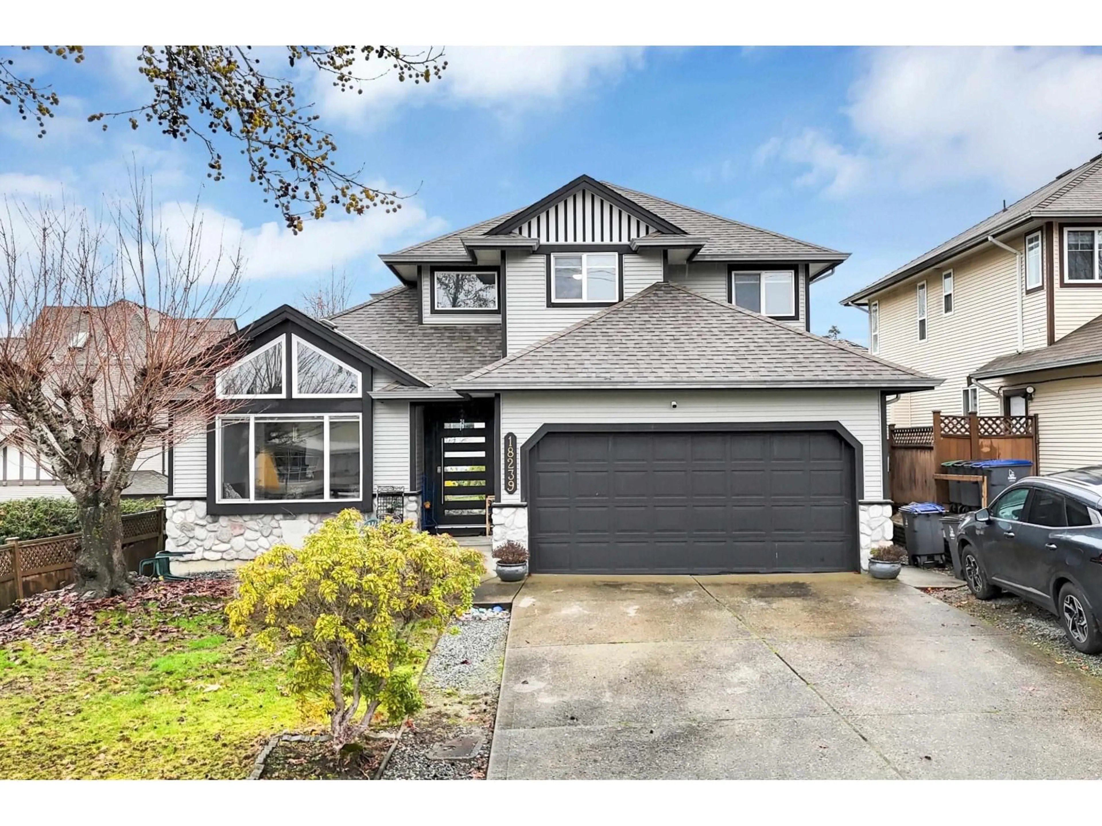 Home with vinyl exterior material, street for 18239 68 AVENUE, Surrey British Columbia V3S9C6