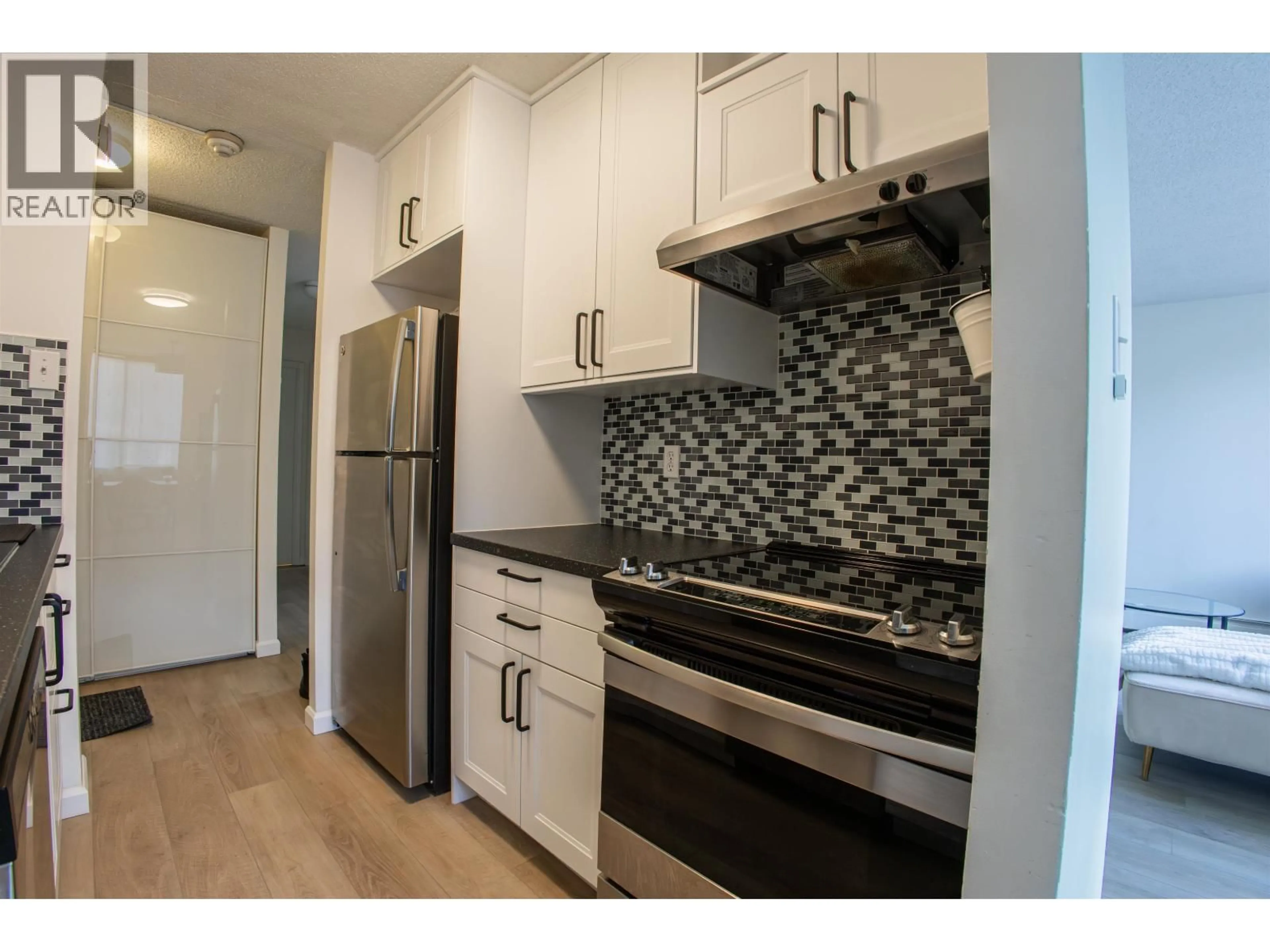 Standard kitchen, wood/laminate floor for 204 - 4200 MAYBERRY STREET, Burnaby British Columbia V5H4A7
