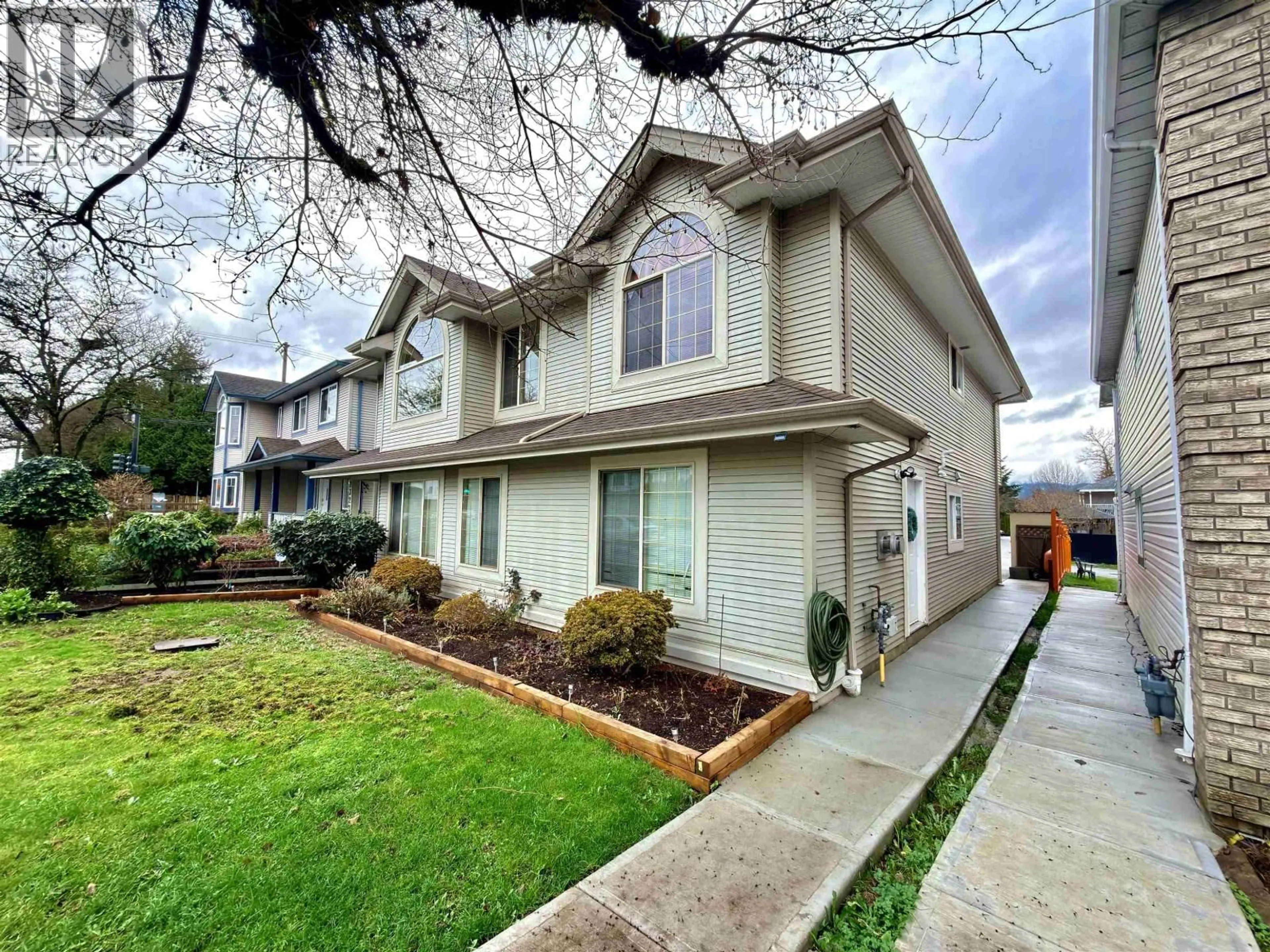 Home with vinyl exterior material, street for 23225 124 AVENUE, Maple Ridge British Columbia V2X1R6