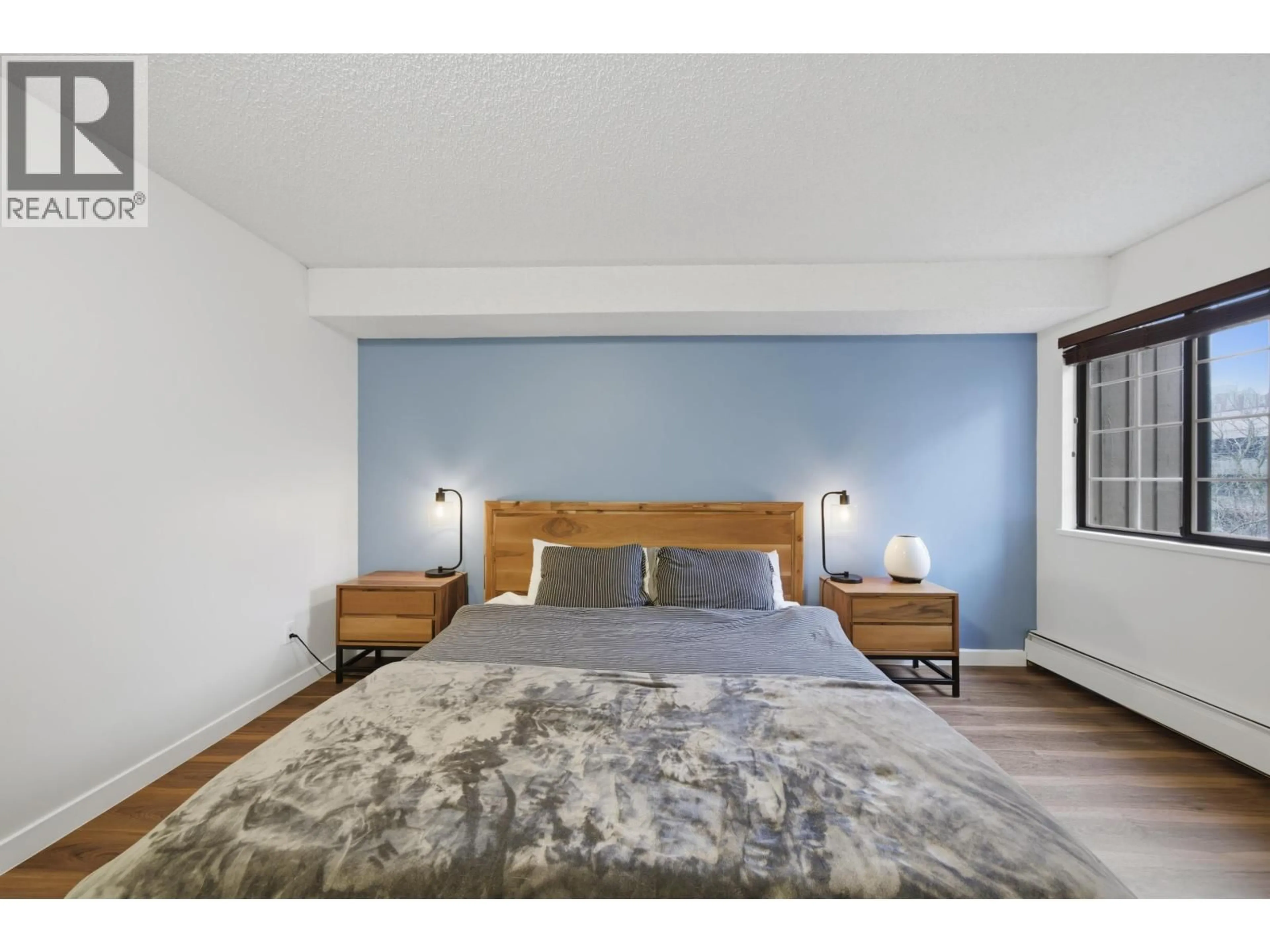 Bedroom with bed, wood/laminate floor for 238 - 8500 ACKROYD ROAD, Richmond British Columbia V6X3H8