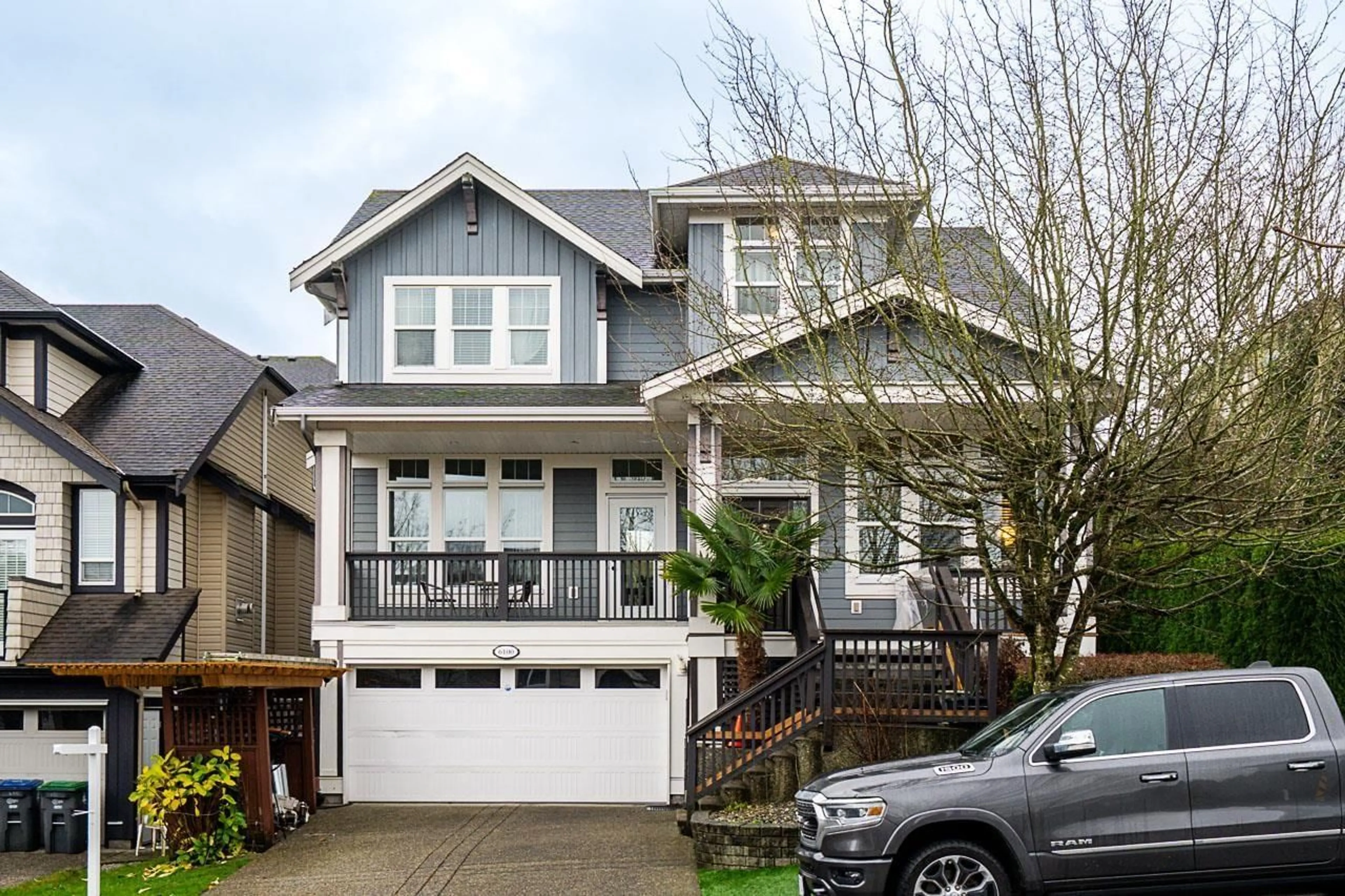 Home with vinyl exterior material, street for 6100 163B STREET, Surrey British Columbia V3S3W2