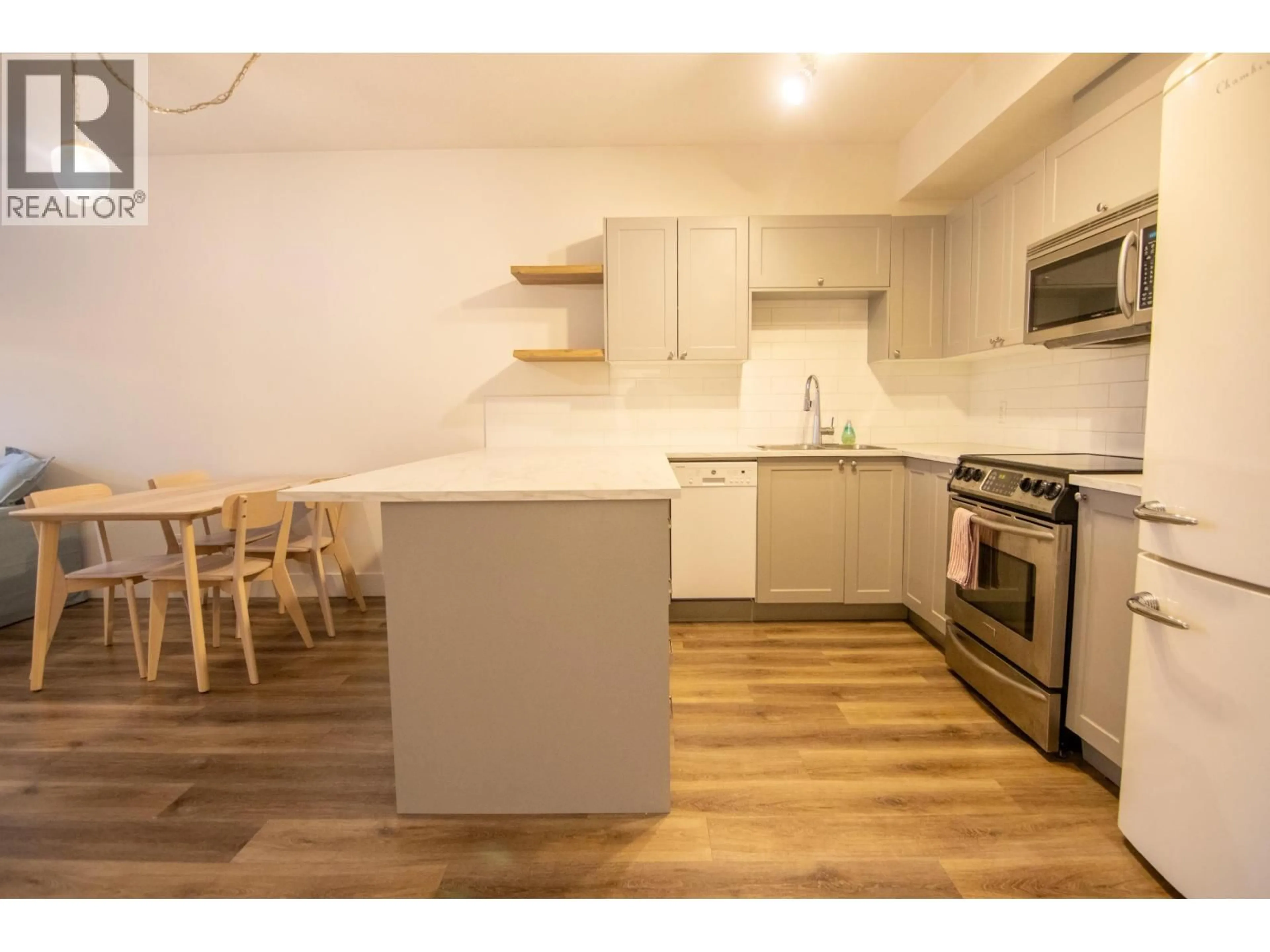 Standard kitchen, wood/laminate floor for 305 - 7330 ARBUTUS STREET, Pemberton British Columbia V0N2L1