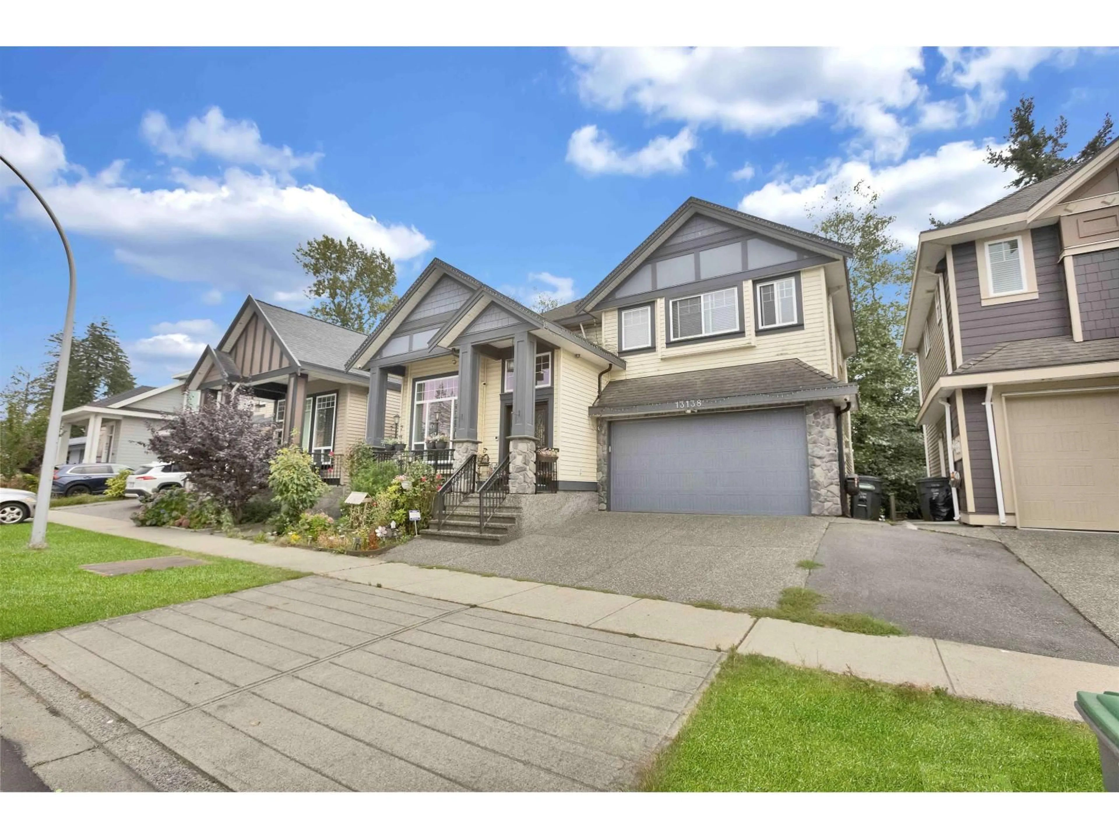 Home with vinyl exterior material, street for 13138 58A AVENUE, Surrey British Columbia V3X0E4