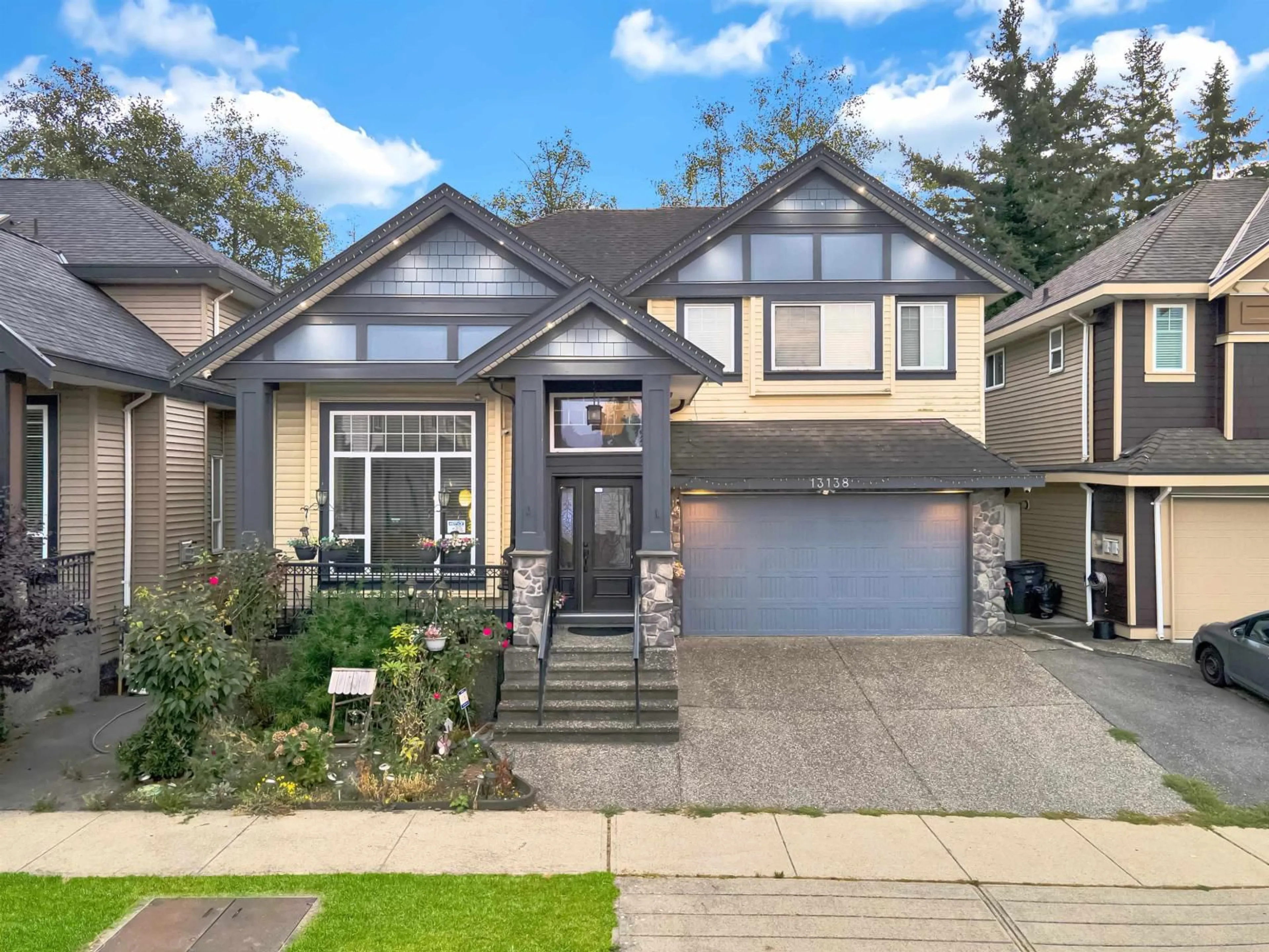 Home with vinyl exterior material, street for 13138 58A AVENUE, Surrey British Columbia V3X0E4