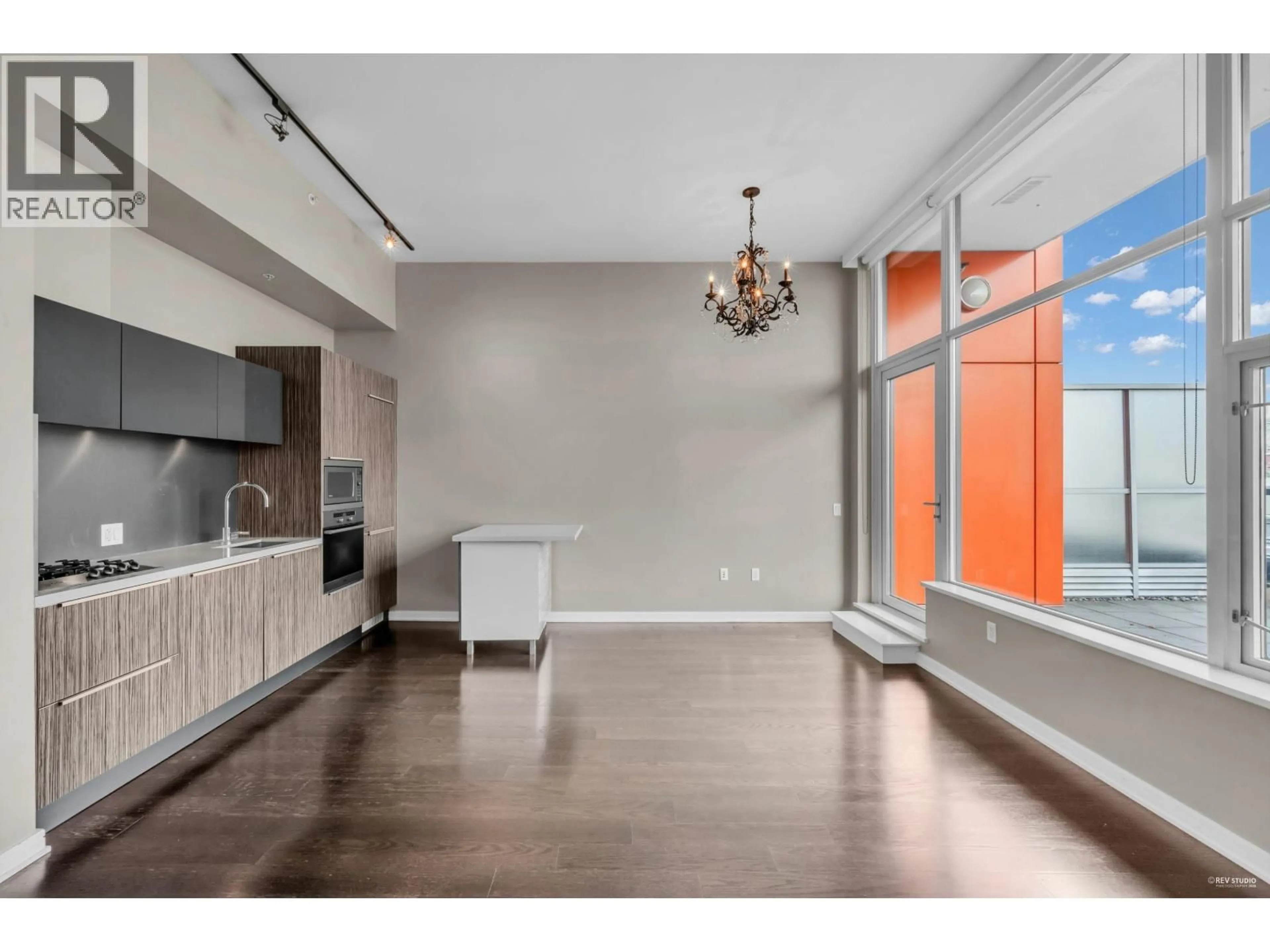 Open concept kitchen, wood/laminate floor for 802 - 123 1ST AVENUE, Vancouver British Columbia V5Y0E2