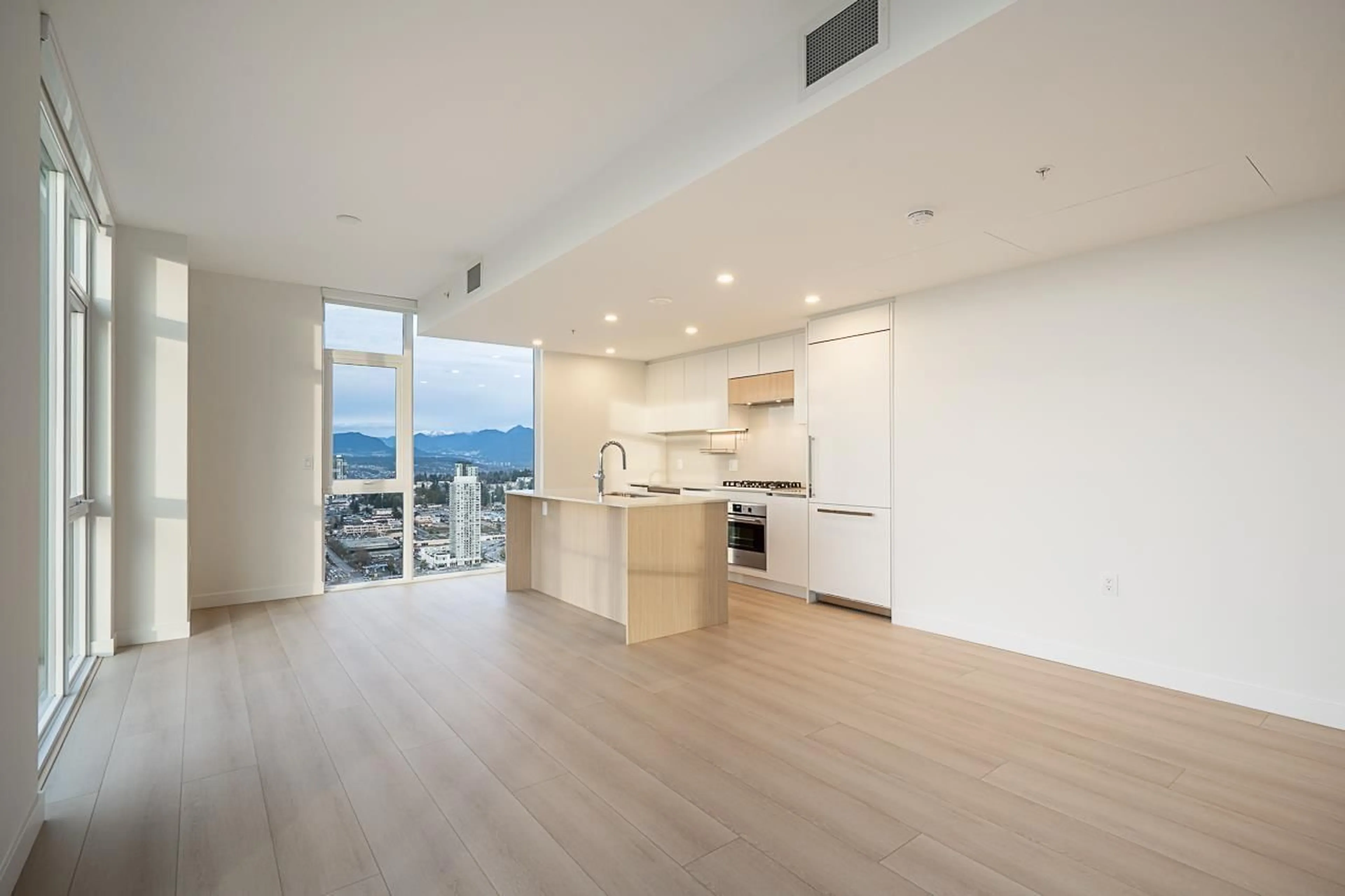 Open concept kitchen, wood/laminate floor for 3808 - 13573 98A AVENUE, Surrey British Columbia V3T0X1