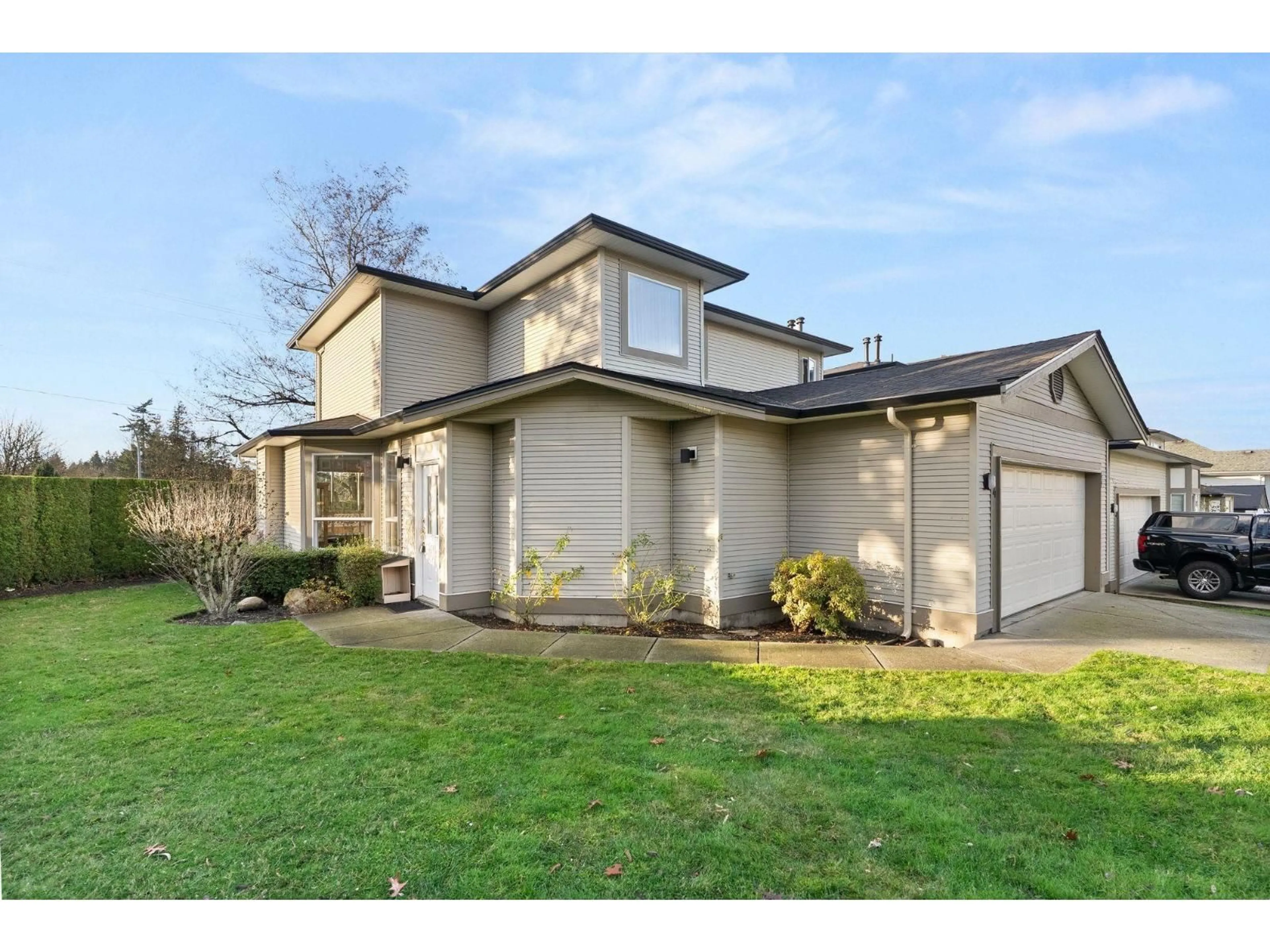 Home with vinyl exterior material, street for 4 - 20881 87 AVENUE, Langley British Columbia V1M3X1