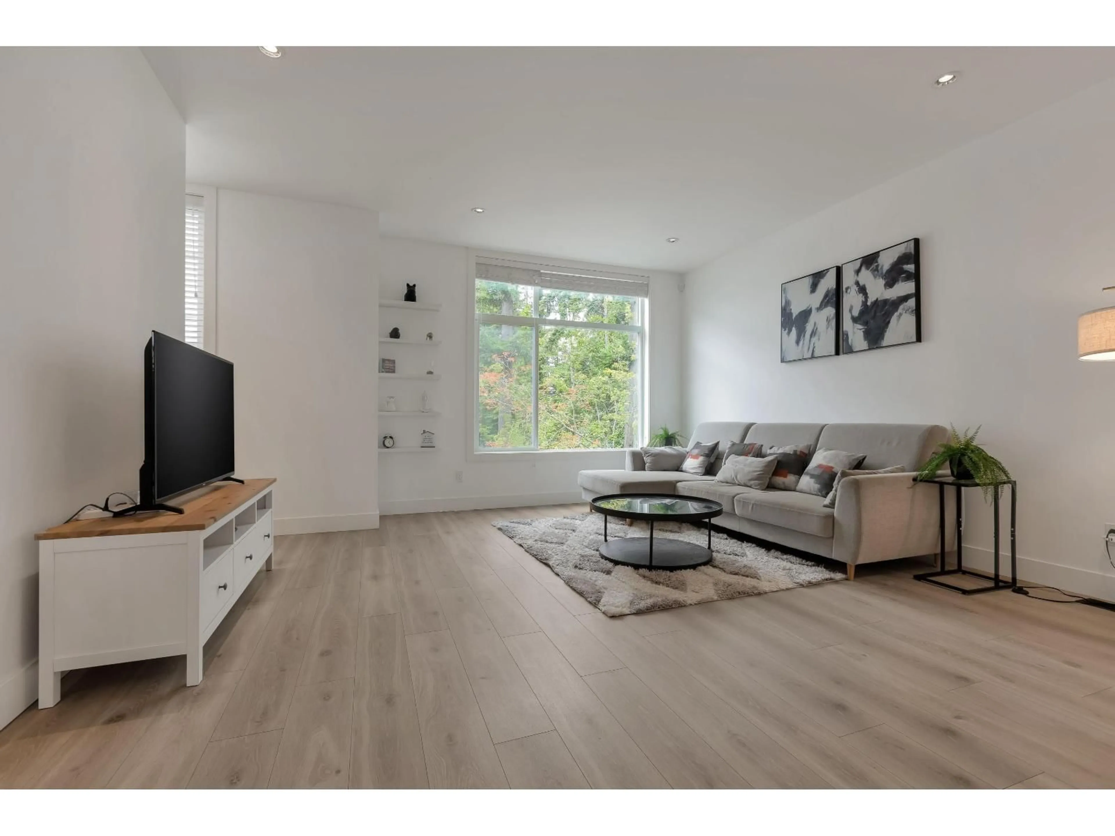 Living room with furniture, wood/laminate floor for 9 - 2328 167A STREET, Surrey British Columbia V3Z1H2